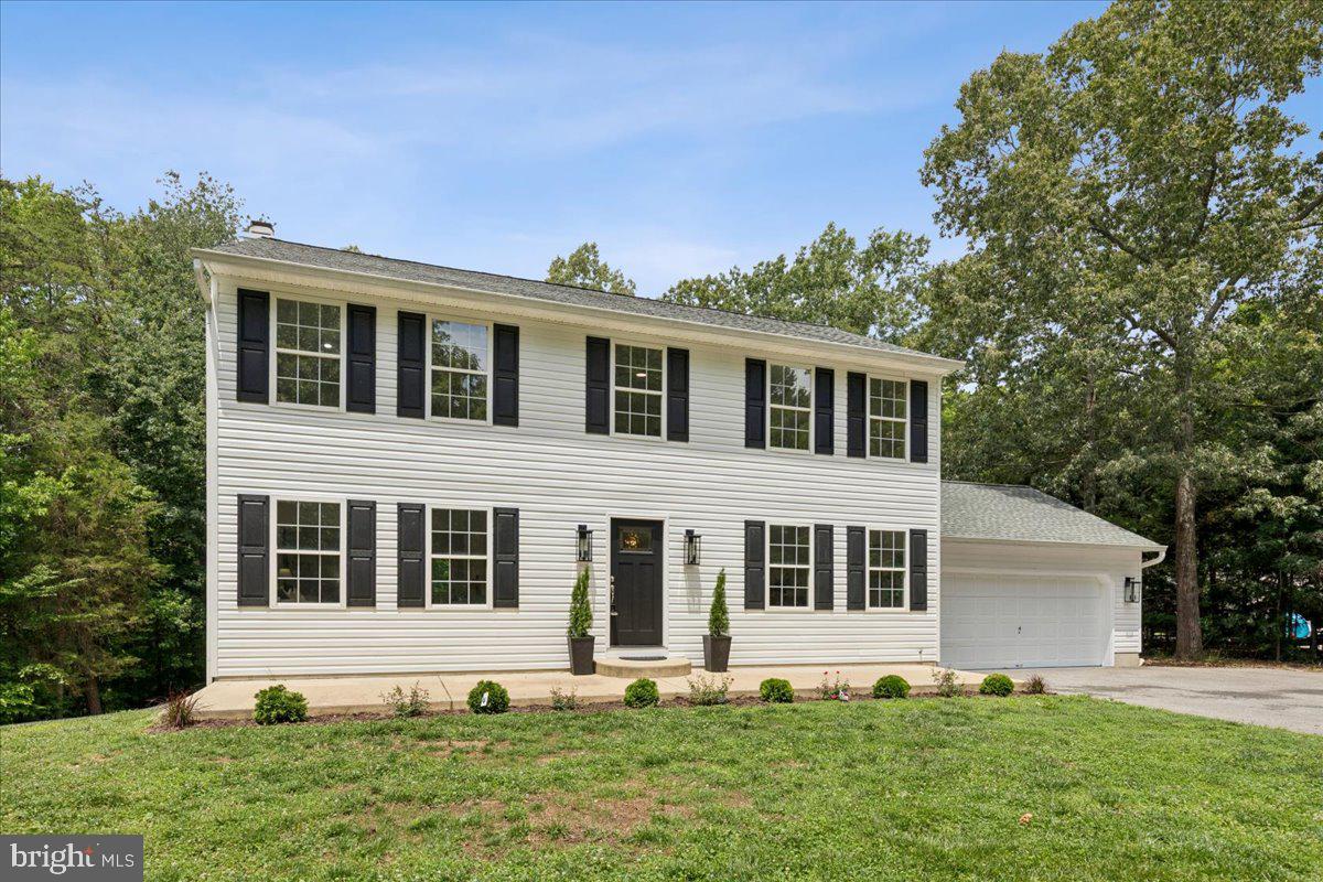 Beautifully Renovated Home on 1.17 Acres in a Prime Location
This stunning, move-in-ready home sits on 1.17 acres and offers the perfect combination of space, style, and versatility. Beautifully refinished hardwood floors flow throughout the first and second levels, while the fully finished walkout basement features luxury vinyl plank flooring, a full bathroom, laundry area, and potential for an in-law suite or rental income opportunity.
The home features 5 bedrooms, 3 full bathrooms, and 1 half bath, along with multiple living spaces designed for comfortable everyday living and entertaining. Enjoy a formal dining room, a two-car garage with direct access to the home, and a thoughtfully updated interior throughout.
The renovated kitchen boasts gorgeous quartz countertops, white cabinetry, stainless steel appliances, and a movable center island that allows for flexible use of the space.
The beautifully updated bathrooms showcase elegant tile work, stylish vanities, and quality finishes. A  added second laundry room on second floor bedroom level provides additional convenience to this well thought out home.  Outside, you'll find attractive landscaping and a spacious backyard ideal for entertaining, recreation, and outdoor enjoyment.
Don't miss this exceptional property offering modern updates, generous living space, and endless possibilities in a highly desirable location.