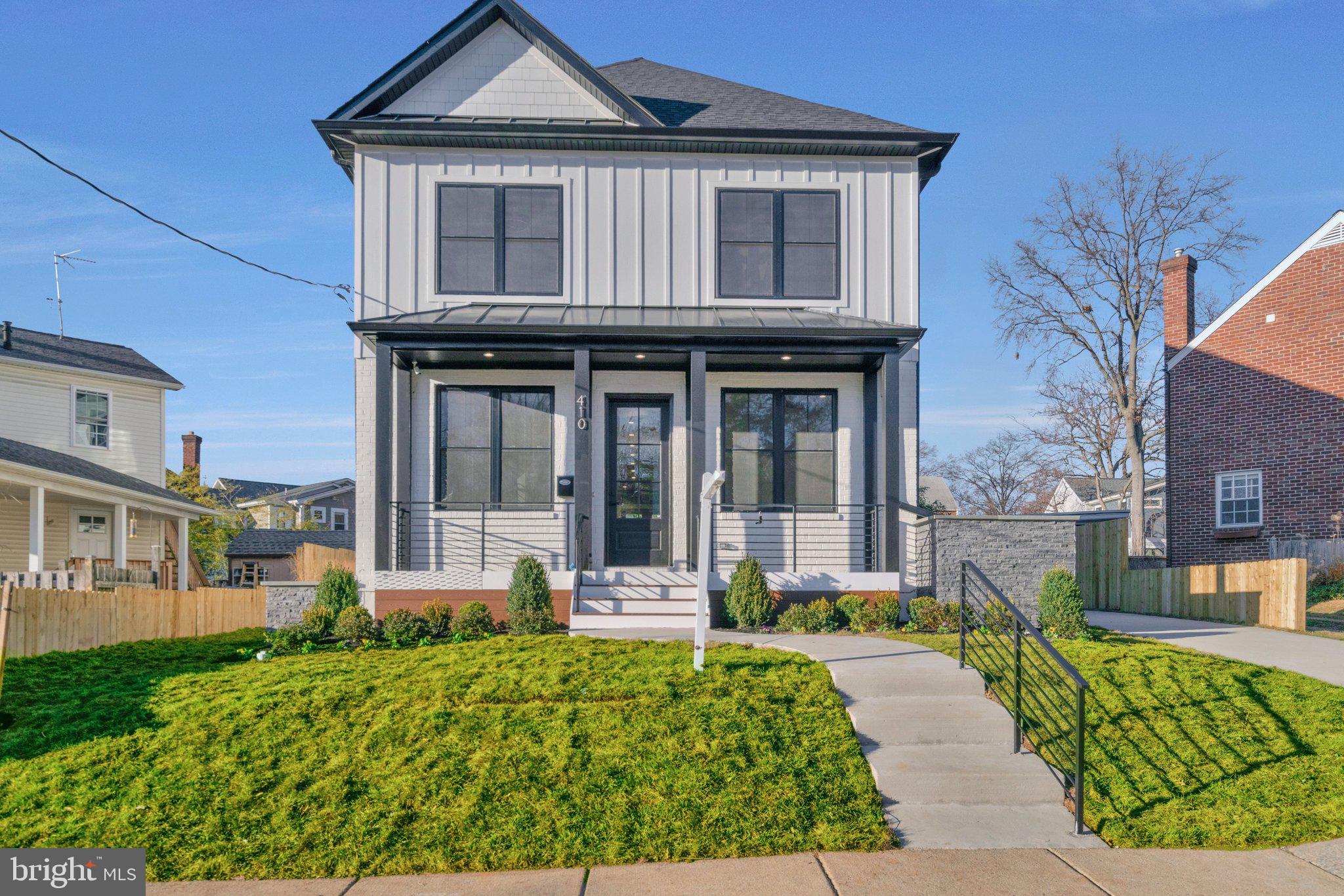 THIS BRAND NEW HOME IS A MUST SEE!  AMAZING NEW HOME LOADED WITH CUSTOM UPGRADES THROUGHOUT!! 

This amazing new construction home located in a peaceful cul-de-sac boasts 6 beds, 5 full size luxury baths, 1 half bath, a dog bath and an accessory dwelling unit! Enter through the front door into a spacious and bright home with 10' ceilings, an open floor plan, and lots of space for entertaining. Enjoy the electric fireplace in the expansive living area and prepare gourmet meals in the beautiful kitchen equipped with Quartz countertops, a waterfall island with seating overhang, 2 sinks, top of the line commercial grade Jenn-air appliances including a 6-burner stove with griddle, dual ovens, a wine cooler, built in 42" hood with make-up air system and a huge refrigerator! The living area is full of light with many windows and a French door opening up to a picturesque two-tiered deck overlooking the beautiful lawn. Hardwood floors, Board and batten accent walls, tray ceilings with recessed lighting and crown molding can be found throughout the home. A formal living room, dining room and home office rounds out the main floor. The home office features a fully installed security surveillance system and wired ethernet connection.

The upper level features a large 72" wide hanging LED chandelier, 4 large bedrooms, 3 full bathrooms, a laundry room and a spacious foyer. The master bedroom has a walk-in closet and a balcony with French doors. The fully finished lower level includes a separate gym, a laundry room with dedicated pet washing station and large utility sink with vanity, a bedroom with attached full bathroom and a large recreation area with a fully equipped wet bar with a wine cooler! The lower level also features a walk out for access to the backyard.

An accessory dwelling unit above the garage includes a kitchenette, full bath and laundry which may be used as an au pair suite or as a source of rental income! In addition, the garage is a beautiful fully finished, insulated and climate-controlled space and includes an electric car charging station! An innovative rainwater retention system harvests rainwater for watering the flower beds and lawn! 

Located in a peaceful cul-de-sac, this home is only 1 mile to Ballston Metro and commuter routes. A leisurely walk takes you to Ballston Quarter featuring entertainment, restaurants and shops! 

 Do not miss this opportunity to own this amazing home!!