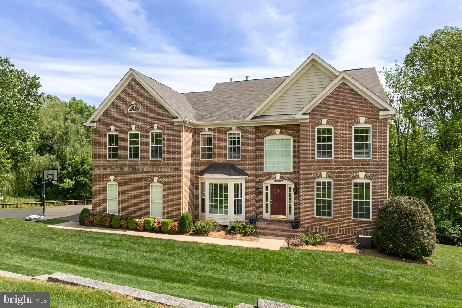 This wonderfully updated colonial offers timeless charm paired with modern luxury. The like-new kitchen, renovated at the end of 2024, is a showstopper—white countertops, stainless steel appliances, gold hardware, pot filler, custom hood, and designer touches throughout make it a true chef’s dream. It opens effortlessly to a sunlit breakfast area and a dramatic two-story family room, complete with a striking fireplace framed by oversized windows.
The main level also features a formal living room and private office, both with custom built-ins. Upstairs, the expansive owner’s suite provides the perfect escape, offering a spacious sitting area, dual closets—including a walk-in with built-ins—and a spa-like bath with soaking tub and frameless glass shower. Three additional bedrooms and a renovated full bath round out this upper level. The main floor and upper levels feature hardwood floors throughout. 
The finished walk-out basement is ideal for entertaining or relaxing, featuring a large rec room, guest bedroom, full bath, and a generous storage space with room to expand. Step outside and experience exceptional outdoor living with a massive screened-in porch, a full-length deck perfect for year-round enjoyment, and a fantastic playground area that everyone can enjoy. 
Recent updates: Remodeled Kitchen (2024), 3 Season Porch and Deck (2021), 2 New HVAC's  (2020), Whole Home Generator (2022), Hardwood Floors Uppr Lvl & Stairs (2022), Platform Playground and Washer Dryer (2023) 
Style, space, and sophistication in an ideal Vienna location. You won’t want to miss this one!
This home is conveniently located to great shopping, restaurants, Reston Town Center, Lake Fairfax Park and Nova Wild Zoo & Safari.  Easy commuting to the Toll Road, Route 7, Silver Line Metro and Dulles Int’l Airport.