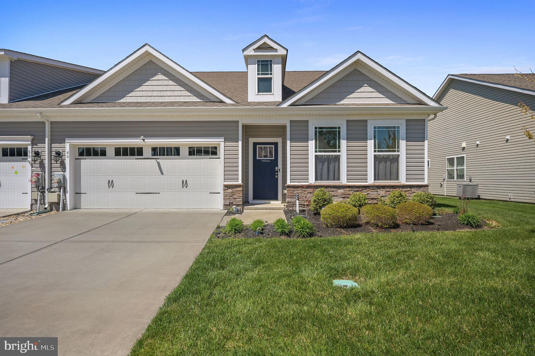 Not a 55+ Community!!!

Experience the perfect blend of modern luxury and small-town charm at 46 Sedmont Circle, a stunning contemporary twin home in the desirable Bergmont Woods community. This meticulously maintained 3-bedroom, 2-bathroom residence offers 1,773 square feet of thoughtfully designed living space, featuring the high-end Platinum "Crisp Cool" interior scheme.

At the heart of the home, the chef-inspired kitchen boasts Luna Pearl granite countertops, crisp white cabinetry, and a Level 1 stainless steel gas appliance package. The expansive open-concept living area is bathed in light from recessed LED fixtures and features elegant crown and panel molding throughout the foyer, great room, and owner's suite. Cozy up by the gas fireplace with its classic slate surround or enjoy the seamless transition to the outdoors through the rear patio.

The striking exterior is finished in Harvard Slate siding with sophisticated stone accents and includes a whole-yard irrigation system to keep your landscape pristine.

Nestled in a professionally managed community, residents enjoy a suburban atmosphere with a monthly HOA that covers common area maintenance. The neighborhood is designed with sidewalks and street lights, perfect for those who enjoy an active lifestyle.

Located in the vibrant and historic town of Smyrna, you are perfectly positioned to enjoy everything the area has to offer.
Nature & Recreation:  Just minutes from the 90-acre Big Oak Park, featuring walking trails and playgrounds, and the scenic beauty of Lake Como.
Arts & Dining: Explore the Smyrna Opera House for live performances or indulge in local favorites like Pit Daddy's BBQ and the Elizabeth Esther Cafe.
Unbeatable Proximity: Commuting is a breeze with quick access to DE-1 and US-13, putting Dover just 20 minutes away and Wilmington within a 50-minute drive. 

Discover why Smyrna is celebrated for its rich history, walkable streets, and friendly community atmosphere. 46 Sedmont Circle is more than just a house; it’s your gateway to the best of Delaware living.