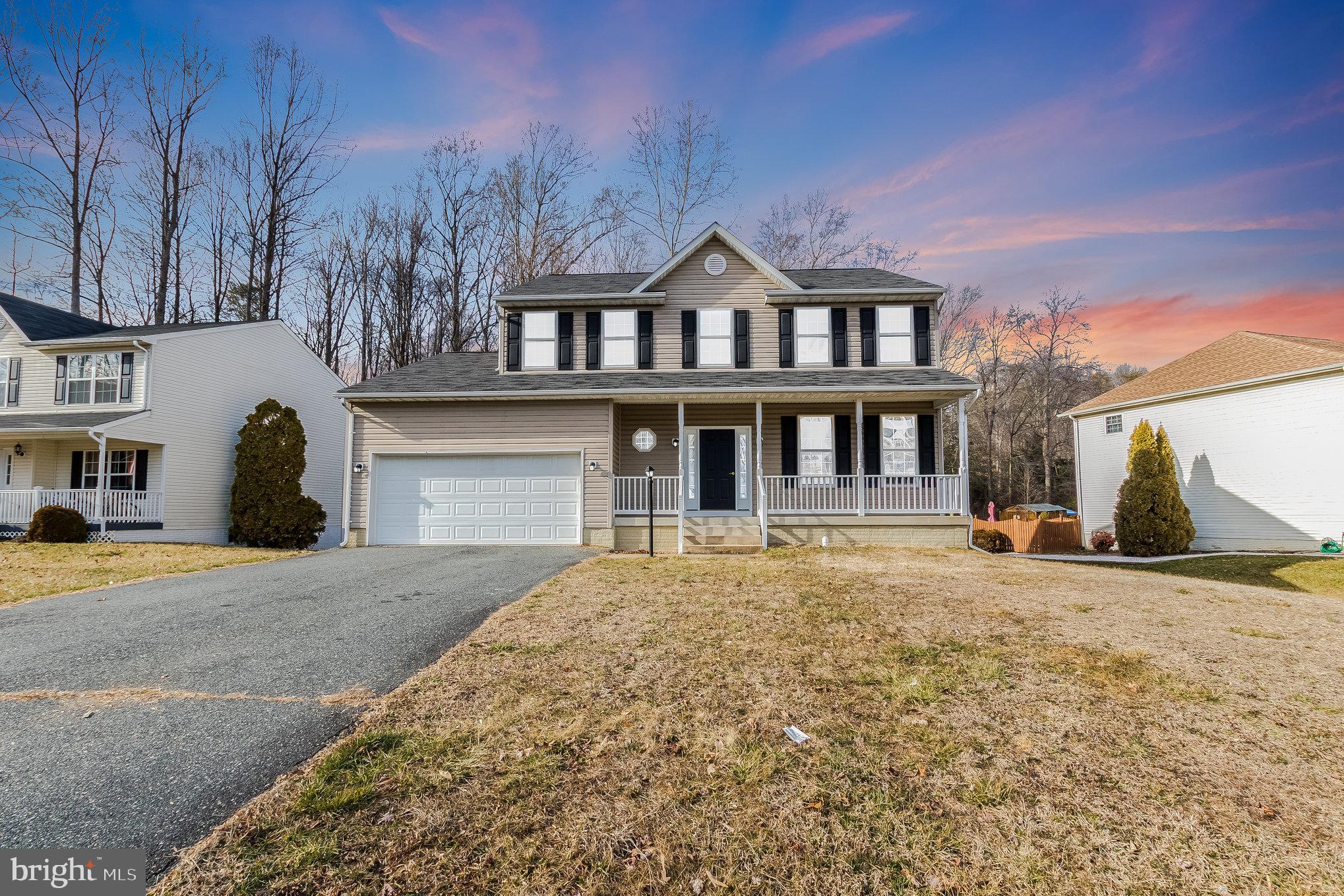 Welcome to this bright and airy spacious colonial home, freshly painted and ready for you to move right in! Situated in a prime location for commuters and conveniently close to Quantico, this house offers the perfect combination of comfort and accessibility. As you step inside this 4 bedroom home you'll be greeted by an abundance of natural light that fills the airy rooms, creating a warm and welcoming atmosphere. The layout makes it easy to flow from one room to the next, providing plenty of space for both relaxation and entertaining. The kitchen is well-equipped, featuring beautiful countertops and a kitchen island. Adjacent to the kitchen is the dining room, sunroom, and family room with wood wood-burning fireplace, which leads to the rear deck and patio in a private rear fenced-in yard. Upstairs, the bedrooms are spacious and bright, offering ample closet space and large windows to let in the sunlight. The primary includes an en-suite bathroom, offering a peaceful retreat at the end of the day. With its convenient location and inviting atmosphere, this home has everything you need Don't miss out on the opportunity to make it your own!