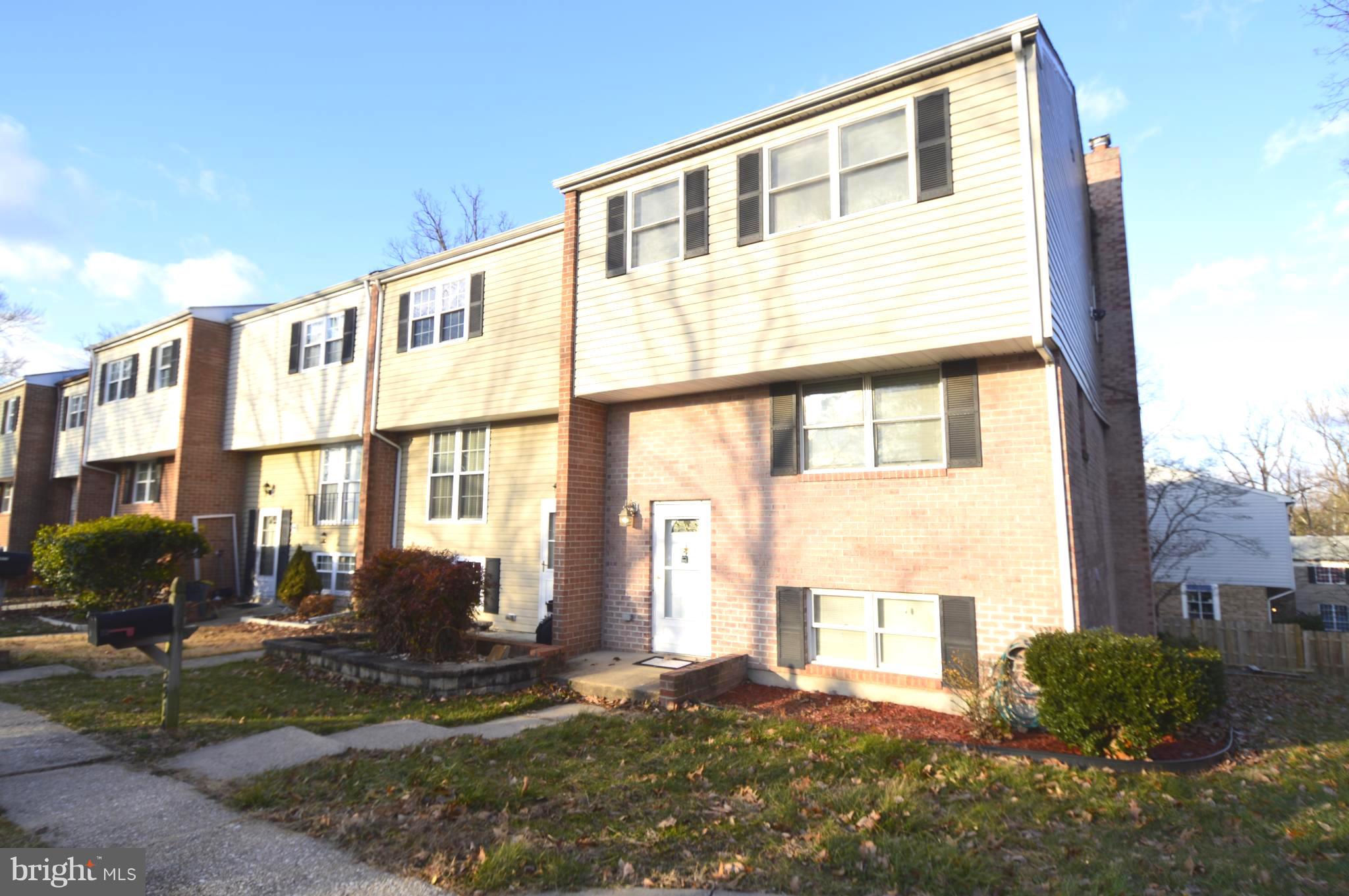 This Lovely townhome was rebuilt from the ground up in 2009 Features 3 bedroons 3 baths Spacious living room with Fireplace  Nice deck off living room Lower level features large family room with Cozy Fireplace  Laundry room, additional storage Walk out from family room to nice lot.