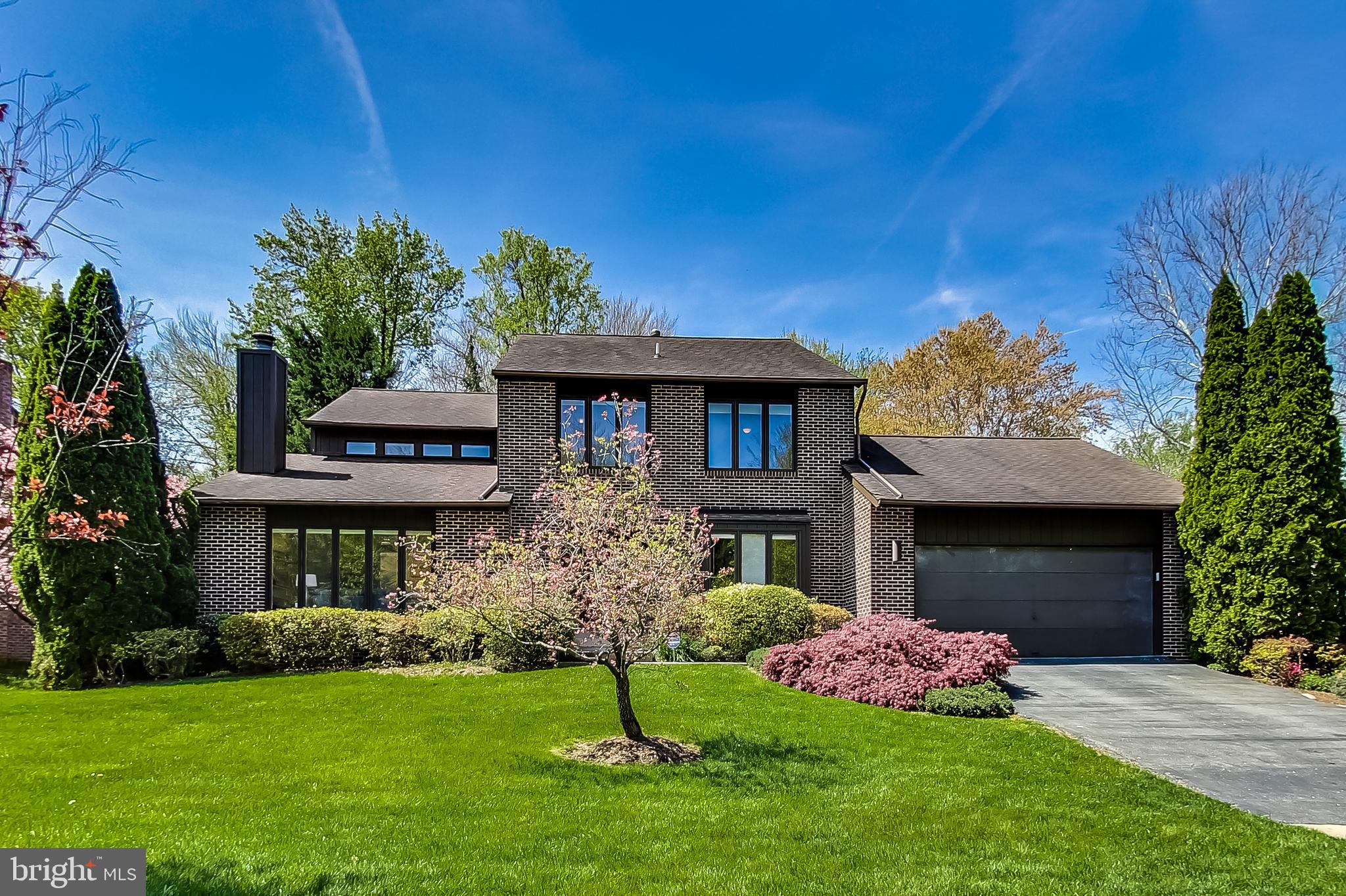 Turnkey contemporary in West Bethesda Park. This beautiful home features five bedrooms, four and a half bathrooms, a spacious in-law suite, an attached two-car oversized garage, and a stunning heated pool and spa.

As you enter the main level you are greeted by a welcoming foyer. To the right, you’ll find a private home office and to the left is the bright living room with a wood-burning fireplace, vaulted ceilings, and large windows. Continue to the spacious dining room perfect for formal entertaining. The gourmet chef’s kitchen features ample cabinetry, granite counters, stainless steel appliances, including double ovens, and a breakfast room with sliding doors that lead to the deck, perfect for enjoying a meal al fresco!  Adjacent to the kitchen is the family room featuring a wet bar, a second fireplace, and double sliding doors that also lead to the expansive deck. A powder room and laundry/mud room complete the main level.

Make your way to the upper level, where you’ll find a peaceful owner’s suite featuring a sitting room, large walk-in closet and luxuriously renovated en-suite bathroom including radiant heated floors and convenient and high-end built-in dressers. The upper level also offers three additional bedrooms; one en-suite with renovated bath, and two additional bedrooms serviced by an updated hall bathroom.  The upper level also features beautiful hardwood floors. The fully renovated walk-out lower level is the perfect in-law suite featuring a second family room with views of the patio and pool, a second kitchen, an additional bedroom, a flex space that can be converted to a gym or second office, an updated full bathroom, a spacious media room and a second laundry room!  The lower level is complete with brand new LVP flooring.  The entire home has recently been repainted throughout, the swimming pool has just been resurfaced, and there is a new pool heater, making this a turn-key property.

Located in the coveted Walt Whitman School district and minutes from downtown Bethesda, shopping, restaurants, parks, and more - this house is the perfect ten!