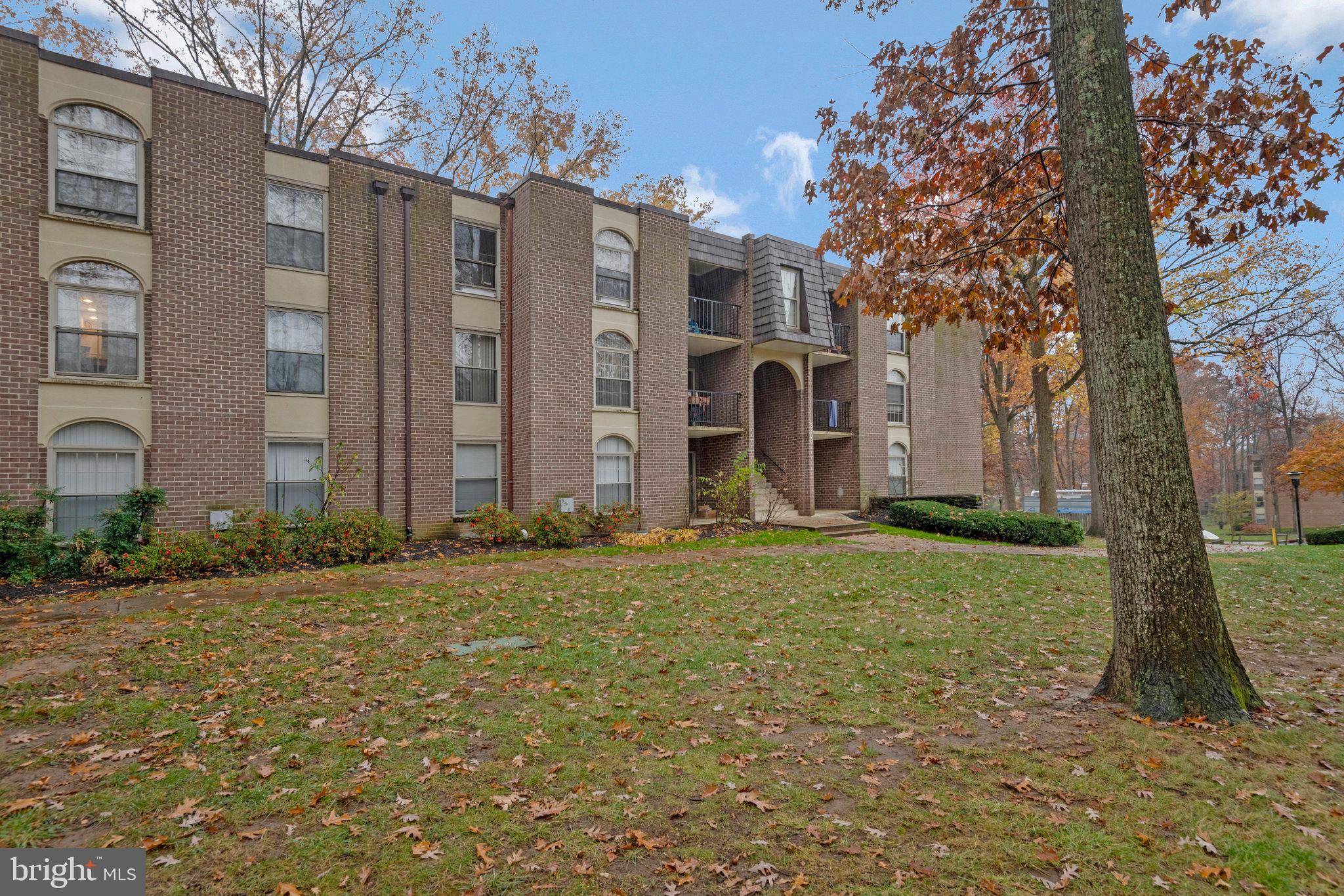 Welcome to Woodburn Village!  This lovely condominium community is conveniently located right next to Inova Fairfax Hospital at Gallows Road and 495.  Unit T2 enjoys both hallway entry and ground level access across from the Community Center and Outdoor Pool!  This 2 bedroom, 1 bathroom property boasts 898 finished square feet of living space, hardwood floors in the living and dining rooms, kitchen and pantry, as well as gas cooking and granite countertops.  The bathroom has been updated with ceramic tile and a tasteful vanity with matching mirror and medicine cabinet.  Utilities are all included in the condo fee - gas, electric, water, trash as well as pool, basketball, volleyball, cooking stations (grills), 1 reserved parking space and meticulously kept grounds.