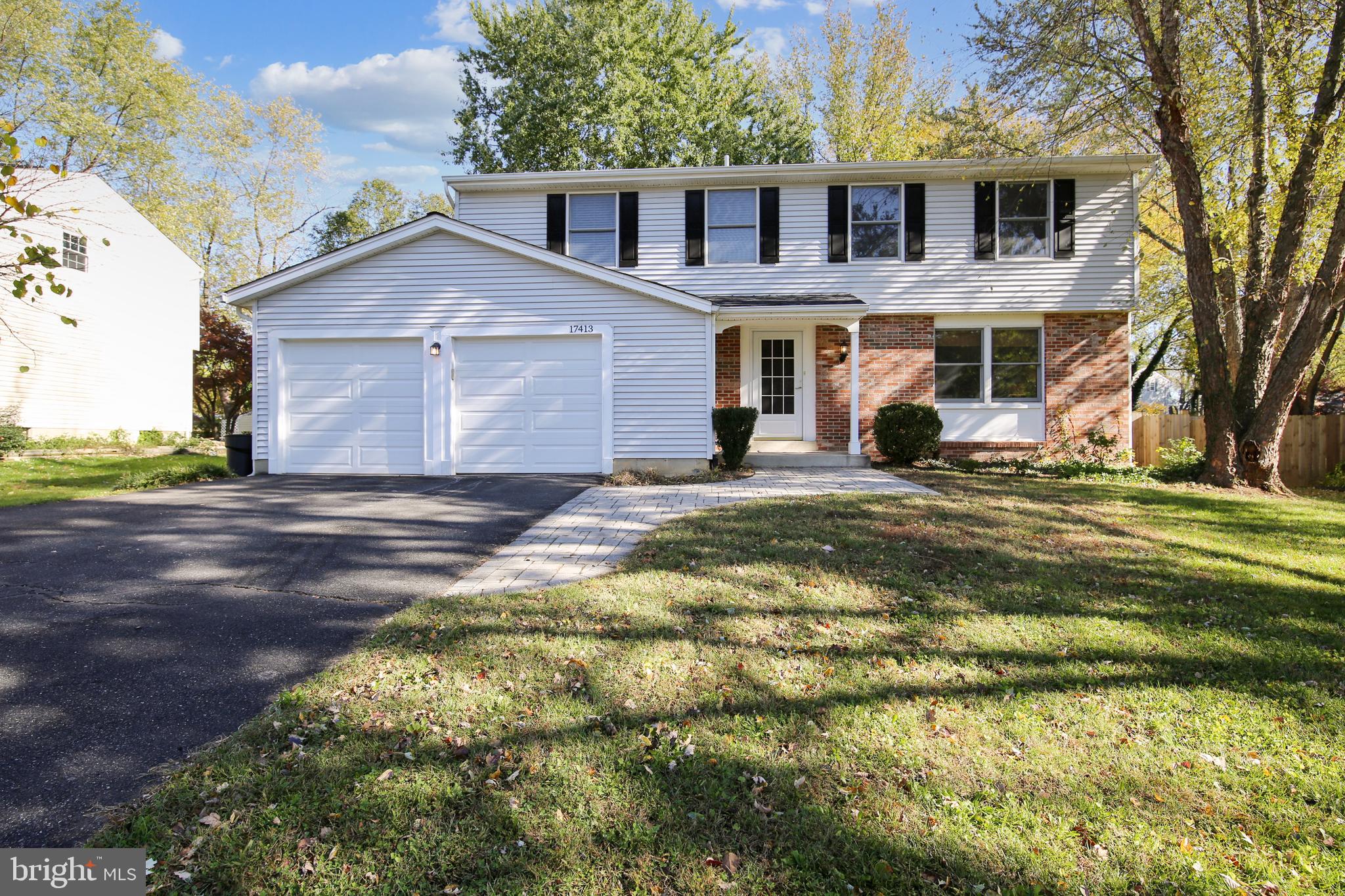 Proudly presenting this 4BR/2.5BA, turnkey colonial, on a wonderful, level lot with a two-car garage! You'll love the renovated kitchen opening to the family room with a wood-burning fireplace.  The main level also features a powder room, an elegant formal living room and a spacious dining room for entertaining.   Care to dine Al-Fresco?  Step outside onto the expansive deck, overlooking the terrific fenced-in backyard.  Upstairs you'll find 4 bedrooms, including a sizable owner's suite with a walk-in closet, dressing area, and updated bathroom.  An additional hall bath services the secondary bedrooms.  The lower level of this home is the perfect space to spread out and have some fun! This space can be used as a recreation room, home office, home schooling area, or a guest suite! Other bonuses include newly refinished hardwood floors on the main level, new carpet upstairs, new roof, and a newly painted interior from top to bottom!  Make this your new home, just in time for the holidays!