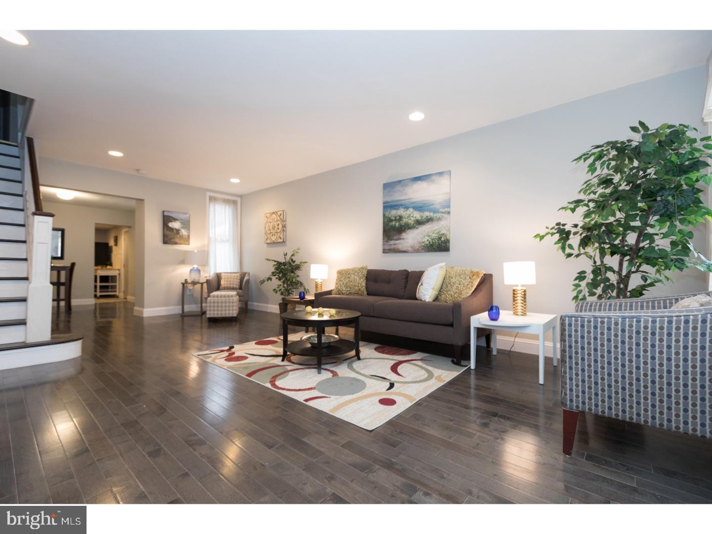 Fabulous newly renovated home in 19148, Pennsport is one of the Hottest South Philly neighborhoods in the city. This gorgeous 3 bedroom home has been rehabbed from top to bottom! This spacious two story, painted brick front home has open concept first floor with gray hardwood flooring and central air. Amenities include brand new hvac, recess lighting, and private patio off the kitchen! There is a large open livingroom and separate dining area on the first floor and elegant, modern kitchen has tons of natural light, granite counter tops, high-end solid wood cabinets, and stainless steel appliances. Upstairs are three bedrooms and a beautiful 3 piece bathroom with tub and shower. The master bedroom has tons of natural light and a large closet. The finished basement has a half bath and is perfect for a second living area or storage and has brand new washer and dryer. Just a short walk from Dickinson Square Park or Jefferson Square Park, where you can enjoy a picnic in the warmer weather. You can pick up all the supplies you need at Acme, Target or IKEA which are just a few walking blocks away. Easy access to public transportation and I-95. This home is ready for you to move right in. Designer staged, this gorgeous new home shows beautifully and will not last long! We welcome your visit today! Property being sold AS-IS. BRAND NEW SEWER LINE INSTALLED JUNE 2018.