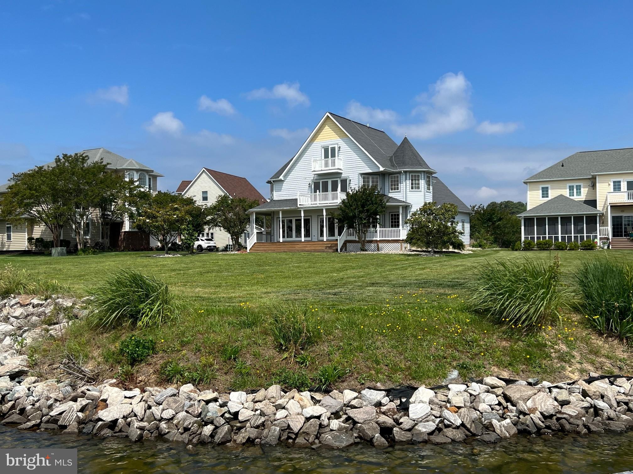 Victorian style home in Piney Point Landings on the Potomac River.  Large open floor plan, 5 bedrooms, 4 1/2 baths, hardwood floors, plenty of windows to take in the views,  This home is situated on the marina which allows you to walk out to your boat slip!  There is a bedroom on the main level with a full bath.  Hardwood floors, wrap around porch, upper level  deck.  Boat slip 25.   Enjoy the neighborhood amenities which include beach, marina, tennis/ pickle ball court, pool, & playground.  Ready for occupancy.