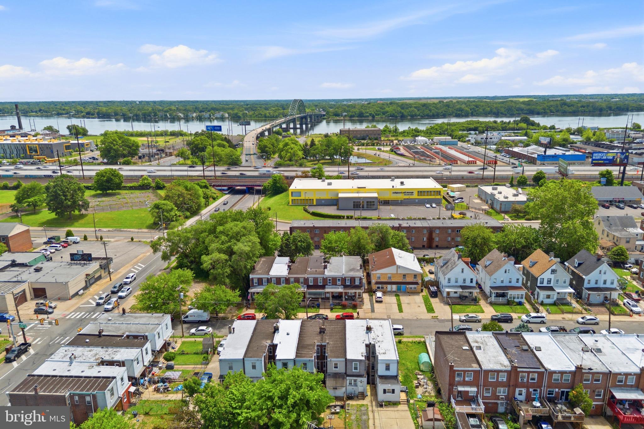 Welcome to this beautifully updated, traditional brick rowhome, residing in the heart of the Tacony neighborhood, of lower NE Philly, just moments from the Tacony Bridge and convenient access into New Jersey.  From the moment you arrive, you’ll immediately notice the clean curb appeal, classic brick exterior, and the feeling of a home that has been thoughtfully refreshed for modern everyday living. Imagine enjoying this Summer, sitting on the covered porch, sipping something cold and refreshing! Step inside to a central air conditioned, bright and open main living area featuring modern flooring, recessed lighting, fresh neutral paint tones, and an airy layout that creates a comfortable flow throughout the main level. The spacious eat in kitchen has been beautifully updated with granite countertops, stainless steel appliances, gas cooking, modern cabinetry, tile flooring, and an abundance of cabinet and prep space rarely found at this price point. The upper level accommodates with 3 bedrooms filled with natural light, along with an updated full bathroom featuring modern tilework and refreshed finishes. Throughout the home, you’ll notice the consistent care and clean modern presentation that allows the next owner to move right in without immediately needing to tackle major cosmetic projects. The full basement provides excellent storage space, laundry area functionality, and additional flexibility for future finishing possibilities. One of the advantages of this location is the convenience; which includes the rear yard/parking driveway. You’re moments from I-95, shopping, dining, & public transportation, making commuting and everyday travel incredibly accessible. Please take a minute to view the Video Tour, and then schedule your in-person showing appointment, today!