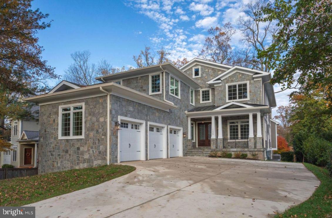 High QUALITY NEW CRAFTSMAN in LANGLEY high school pyramid with SUPERB finishes! Stone elevation blended with hardi-plank. OPEN and SPACIOUS floor plan with 10-and 9-ft ceilings, 2-story front foyer, WIDE and WELCOMING staircase. Spacious SUN-filled rooms. Large GOURMET kitchen with Thermador STAINLESS STEEL appliances, island with prep sink and faucet, butler's and LARGE pantry, UPGRADED granite counter-tops and cabinets. DELUXE trim-work through-out. Direct vent gas fireplaces with stone full-height back-splashes. Family room with COFFERED ceiling. OAK hardwood floors on entire 2-levels. IN-LAW-suite on main level. BEAUTIFUL master-suite with HUGE sitting area, ample WALK-IN closet and vaulted ceilings, EXOTIC master bathroom with separate soaking tub, heated MARBLE floor, rain shower with MULTIPLE shower-heads, tile-to-the-ceiling shower and corner soaking tub, elongated commode and flooded with 4" led recess lights. Allocated and DISTINCT bathroom to each bedroom. FINISHED rear walk-up basement with upgraded and designer carpet, AMAZING wet bar with EXTREME serving counter-top and wine racks. Ceiling fan pre-wiring. W&D hook-ups. Trex DECK with patio below. LoE glass windows. Side loading 3-car garage. FLAT landscaped with 3-exterior garden hose bibs, spacious and PRIVATE back yard.  Energy efficient dual zone heating and cooling.  PERFECT FOR LIVING & ENTERTAINING!