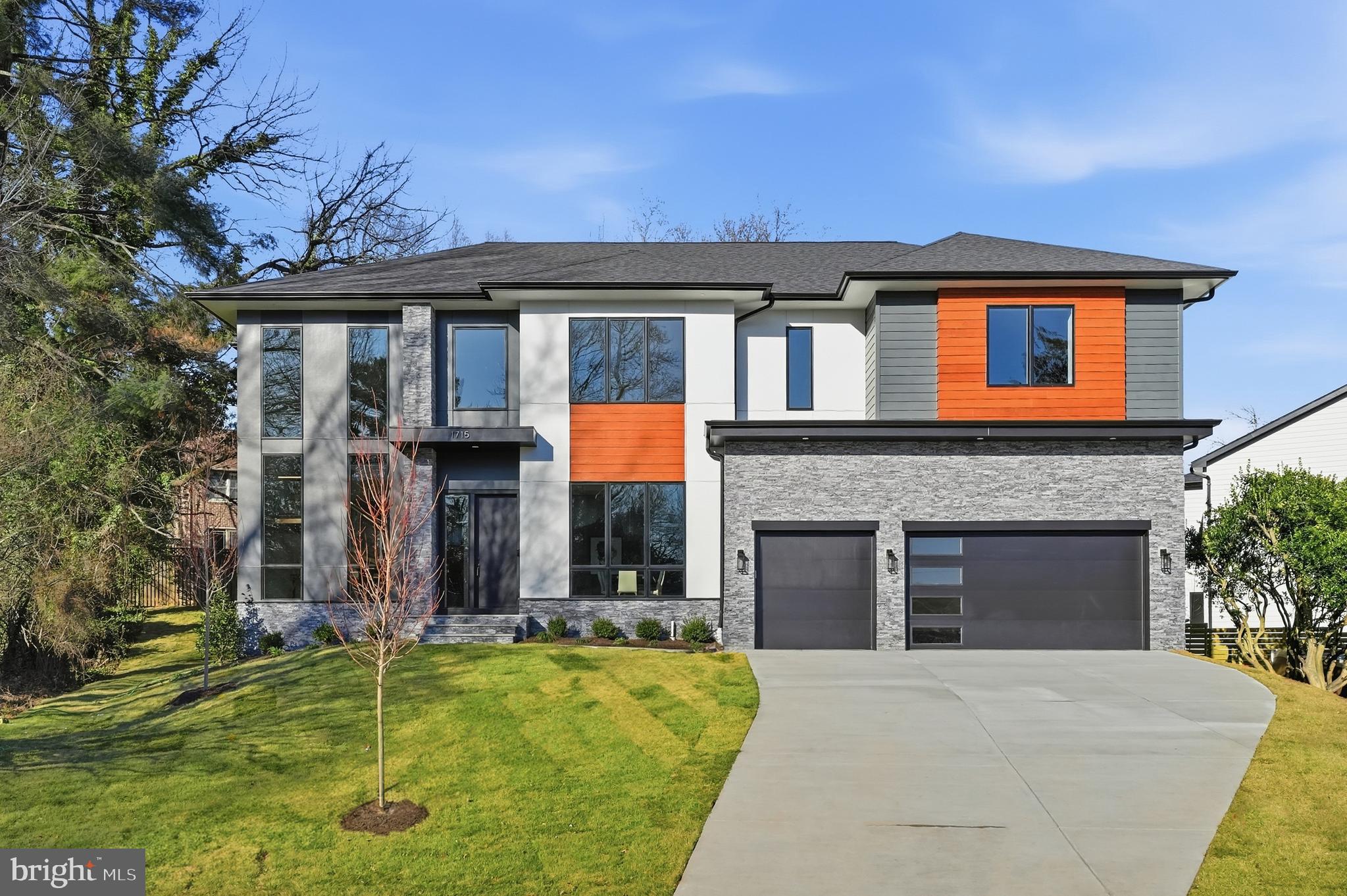 Introducing 1715 Maxwell Ct, a stunning contemporary home located in the sought-after McLean neighborhood. Offering approximately 7,900 sqft of living space across three levels, this thoughtfully designed residence is ideal for modern living and entertaining.

The gourmet kitchen features high-end appliances, quartz countertops, and maple cabinetry. A covered porch and patio extend the living space outdoors, while the fully fenced backyard provides privacy and functionality. Built by Anchor Homes, this home showcases quality craftsmanship throughout.

The primary suite includes a spa-inspired bathroom with a freestanding tub, dual vanities, and a spacious walk-in closet. The fully finished basement offers a media room, wet bar, recreation area, a well-designed wine room, and a private gym with sauna. All bedrooms include walk-in closets.

Builder is offering a lender discount of 0.50% of the loan amount when using builder's preferred lender and title company.  Situated on a 0.3-acre lot and zoned for Haycock elementary school, Longfellow  Middle School, and McLean High School. A rare opportunity for luxury contemporary living in McLean.