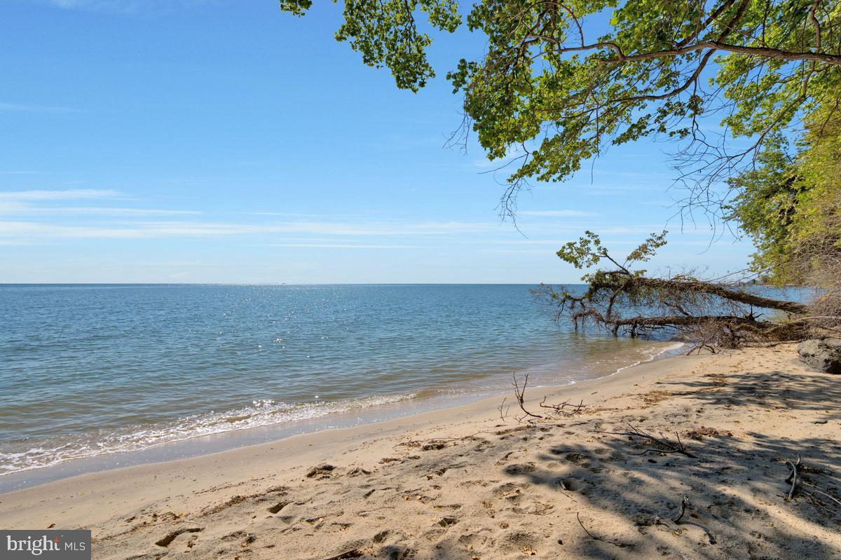 Wake up to breathtaking sunrises and sweeping waterfront views in this charming coastal retreat with access to the Chesapeake Bay and a sandy beach area. Perfect as a vacation getaway or year-round residence, this property offers the ideal blend of relaxation and waterfront living.

An additional building lot is included, 3711 Bayview Dr. providing endless possibilities — keep it separate for added value or combine the parcels to create your dream waterfront estate with room for a much larger home. Enjoy boating, beach days, and peaceful coastal living in a truly special setting. A very unique and rare opportunity!