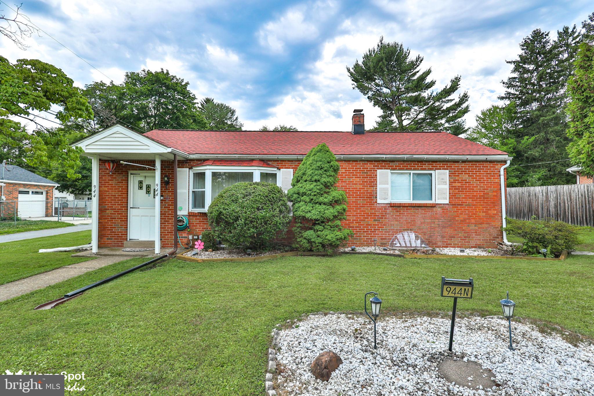 Welcome to 944 N Broad Street, in Allentown's West End neighborhood. This brick ranch offers something that's getting harder to find: genuine space, inside and out. The main floor gives you 1,770 square feet of true one-floor living that moves in an easy loop. The living room with bay window opens to the eat-in kitchen; the kitchen flows into the family room with a wood stove on a brick hearth, and an enclosed sunroom stretches across the entire back of the house. Three bedrooms, a renovated full bath, and main-floor laundry sit off their own hall, so everything you need daily is on one level. The finished lower level adds a rec room, a dedicated workshop, a half bath, and storage at every turn, with even more in the backyard shed. Central air throughout. Out back is where this home really shines. The fully fenced backyard centers on an above-ground pool, with a covered gazebo, a paver patio off the sunroom, and open lawn. There is room to swim, garden, entertain, and spread out. And the West End delivers the neighborhood to match: tree-lined streets minutes from the West End Theatre District, Cedar Creek Parkway, Muhlenberg College, and Lehigh Valley Hospital's 17th Street and Cedar Crest campuses, with quick access to Routes 22, 222, 309, and I-78. Well-maintained by its current owners and move-in ready, this is a home you can settle into now and make your own over time.