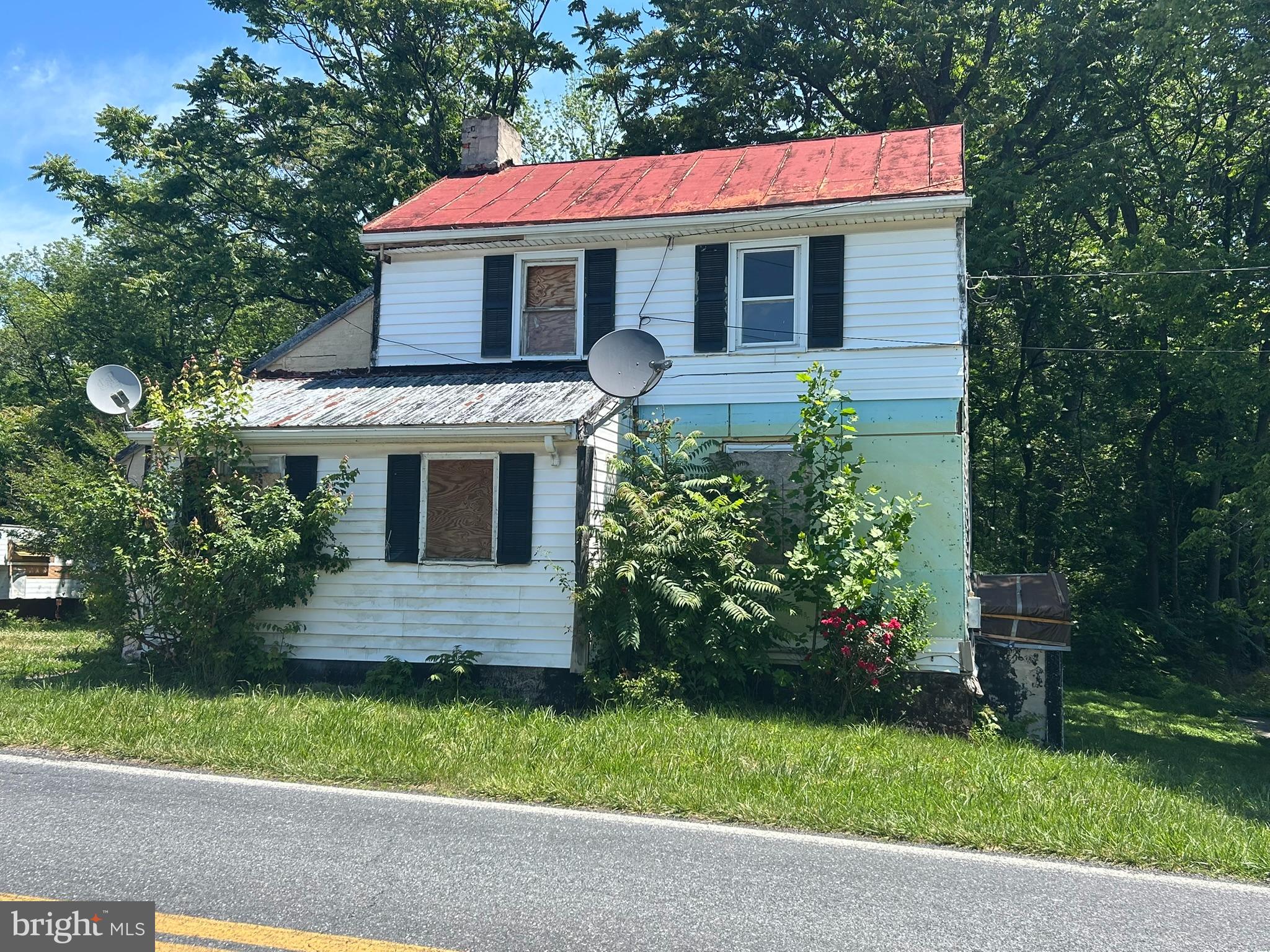Investor opportunity. Property is being sold strictly as‑is and is valued primarily for the land and future use. Existing improvements contribute minimal value and require substantial rehabilitation. Ideal for buyers seeking a project with redevelopment or major renovation potential. Cash or renovation financing recommended. Buyer to perform all due diligence regarding zoning, utilities, and intended use.