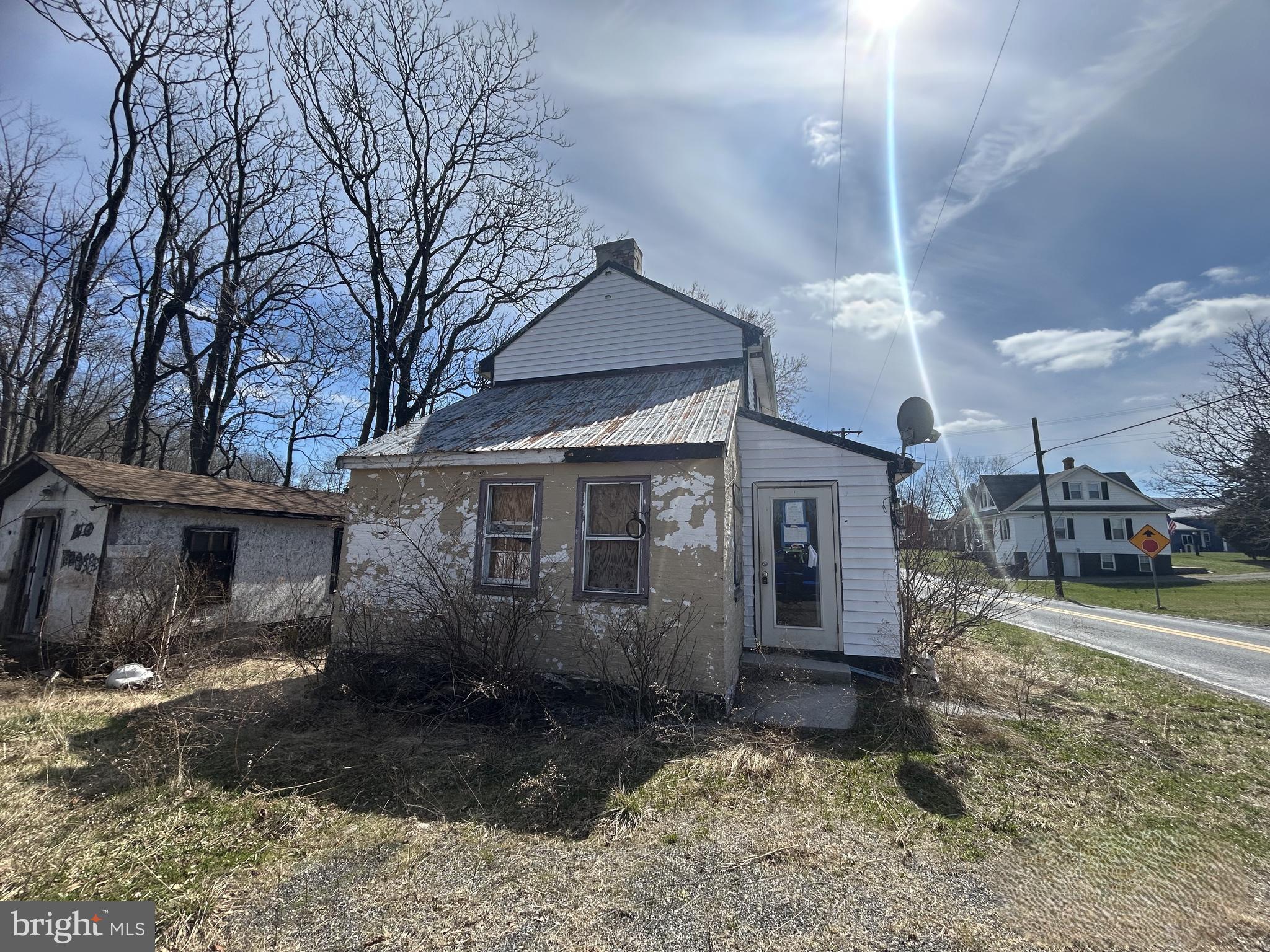 Investor opportunity. Property is being sold strictly as‑is and is valued primarily for the land and future use. Existing improvements contribute minimal value and require substantial rehabilitation. Ideal for buyers seeking a project with redevelopment or major renovation potential. Cash or renovation financing recommended. Buyer to perform all due diligence regarding zoning, utilities, and intended use.