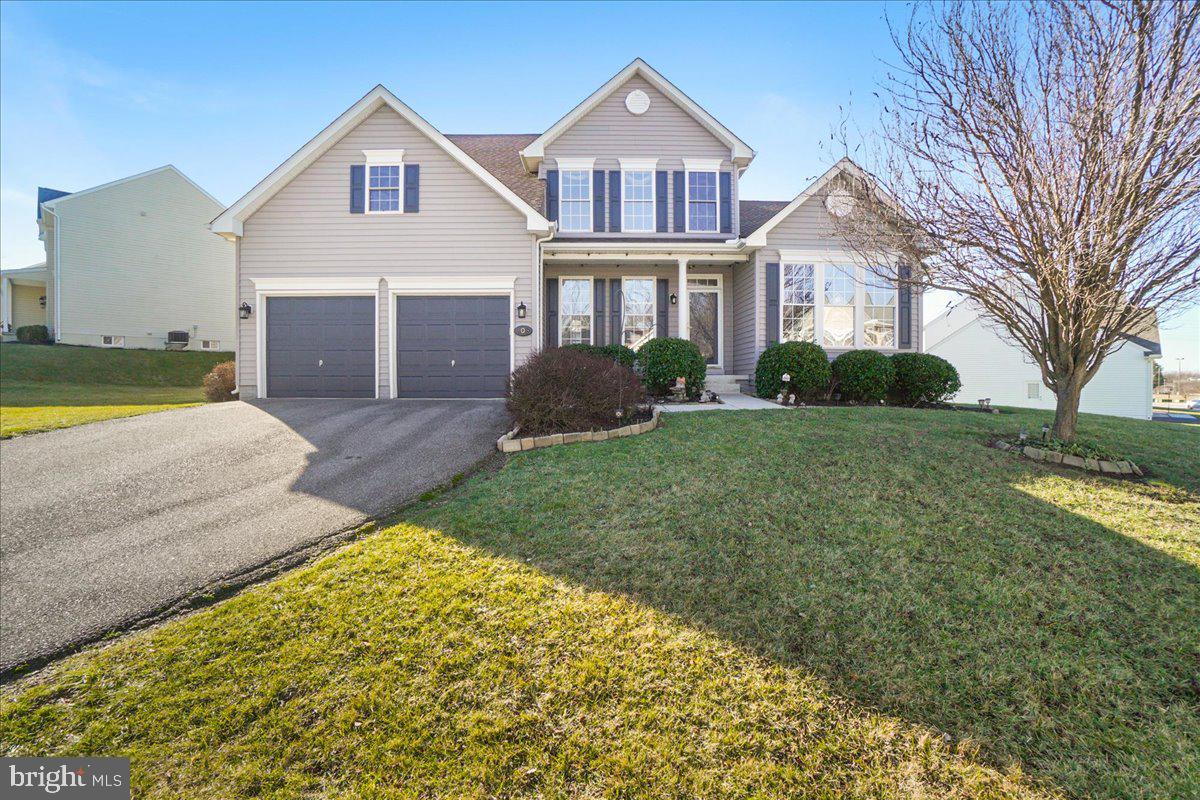 This Fletchers Grove Main Level Living Ausherman Colonial offers 3,628 above ground finished square feet and is tucked away in one of the few communities Boonsboro has to offer.  This home boasts three immaculate levels of living as well as a fabulous appointed exterior spaces for entertaining.  Decorator colors throughout that are warm and welcoming complimented by the 2 story family room with a stacked stone gas fireplace (floor to ceiling) , cathedral ceilings, opening to a spacious kitchen with maple cabinets, granite countertops, kitchen island, breakfast bar, and sunroom bump out.  Two spacious bedrooms upstairs with a loft that could be converted into a bedroom.   The lower level is a fully finished walk up basement offering, a full bath, a separate room (could be used for a variety of spaces, additional  storage  and a handful of options such as  office, workout , virtual learning the list goes on.  This home and its systems has been meticulously loved and maintained by the current owners.  Enjoy the covered front porch or the fenced backyard  and hardscape for family  gatherings and neighborhood parties.  This Gem won’t last long!   Come check it out!