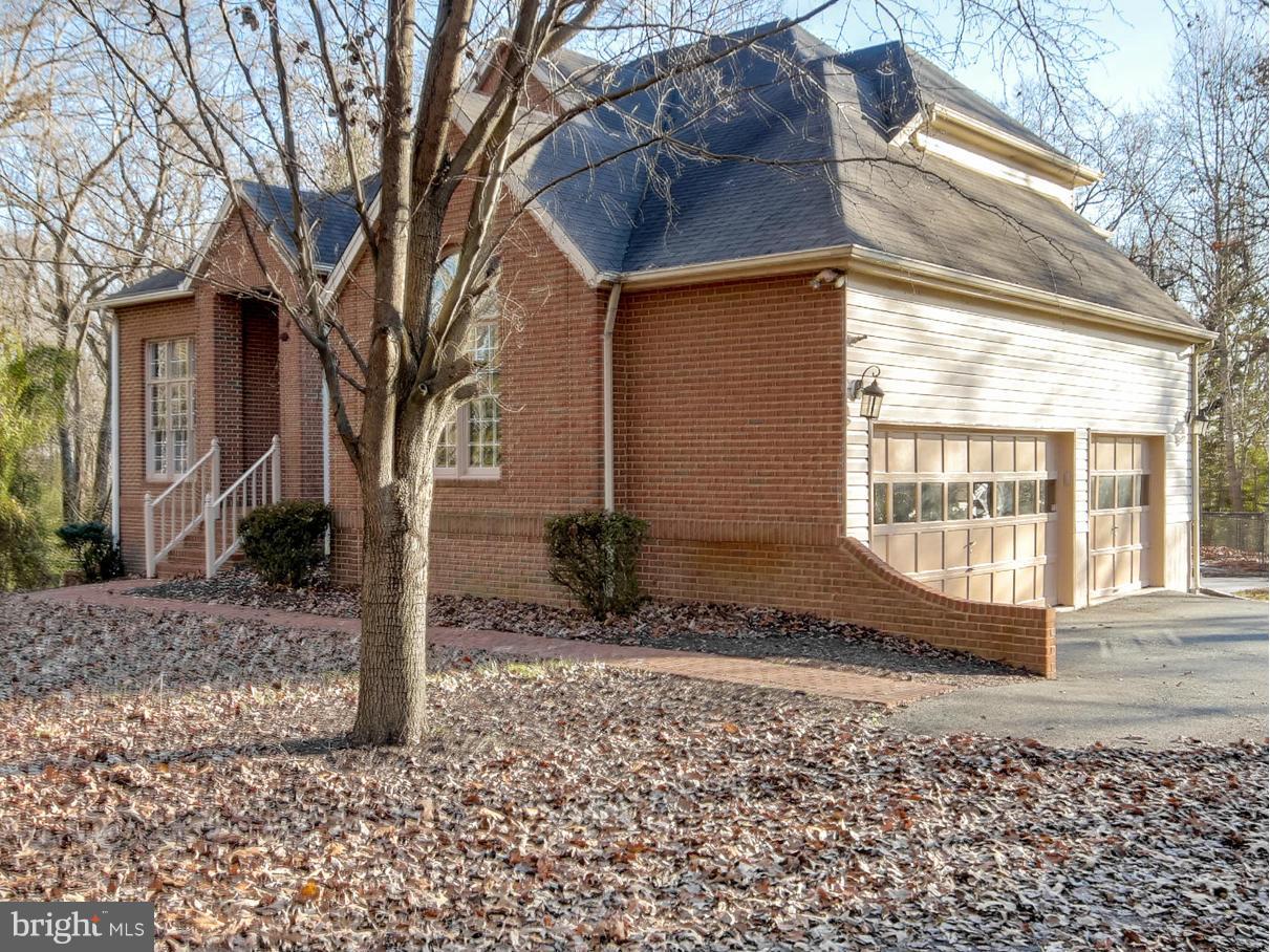 "A MUST SEE!"  ***BRICK FRONT, AWESOME CURB APPEAL, "5 ACRES OF JOY", CUL-DE-SAC, OVER 4600 SQFT, 3 LVLS, FIN W/OUT BSMT, 5BR's, 4.5BA's, HRDWD FLRS, 2 STORY FOYER, GOURMET KIT PKG, CENTER ISLAND W/GAS COOKTOP GRILL, WALL OVEN, 42" CABS, 2 GAS FPLS, 3 CAR GAR (SIDELOAD!) "WHAT A DECK W/IN-GROUND SALTWATER POOL", SPRINK SYS, OUTDOOR ISLAND W/GRILL, WATER ACCESS TO THE POTOMAC RIVER!!!