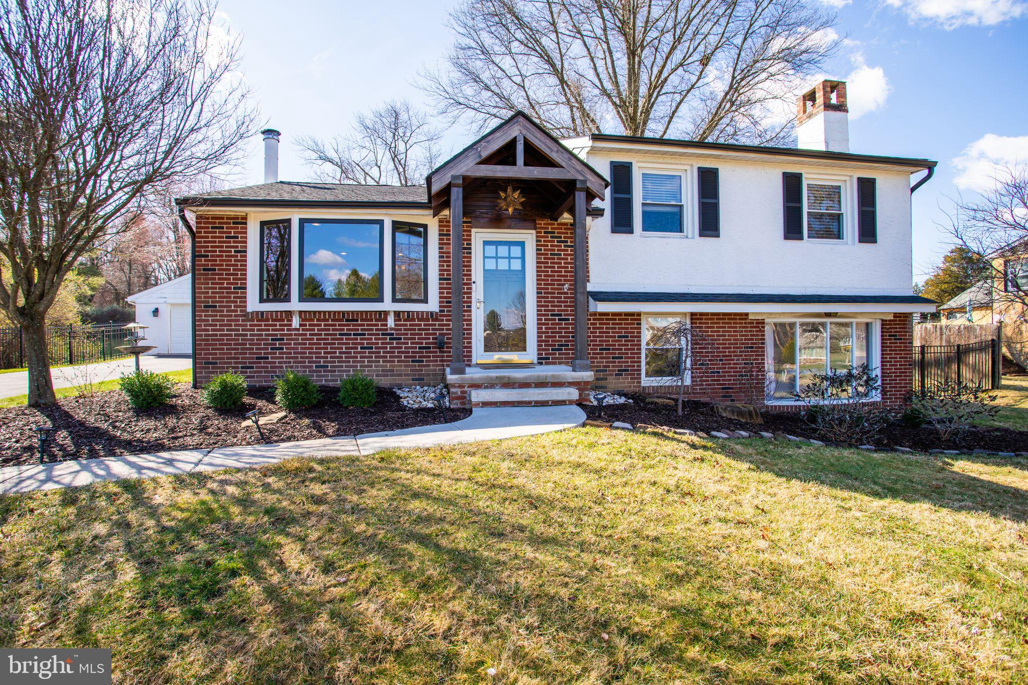 Tucked away in the desirable Council Rock School District, this updated split-level home sits on a beautifully maintained half-acre lot and offers a perfect balance of warmth, functionality, and charm. From the moment you step inside, you’re welcomed into the inviting dining room, where a cozy wood-burning stove adds ambiance and a large bay window, replaced in 2021, bathes the space in natural light. Recessed lighting enhances the atmosphere, making it a wonderful spot for gatherings. The dining room flows effortlessly into the open-concept kitchen, where granite countertops and crisp white cabinets are complemented by a tile backsplash and stainless-steel appliances. Crown molding, recessed lighting, and a convenient counter seating area with upscale pendant lighting add both style and practicality. Beyond the kitchen, the living/family room is a true highlight, with vaulted ceilings, abundant windows, and sliders that lead to the serene backyard. This bright and airy space is perfect for relaxing or entertaining, with recessed lighting, and a ceiling fan, creating a comfortable and inviting ambiance. Upstairs, three generously sized bedrooms offer plenty of space, while the full bathroom features tasteful finishes. The lower level is designed for fun and relaxation, featuring a built-in bar with granite countertops, bar seating, built-in shelves, and a cozy wood-burning fireplace. A laundry room and half bathroom complete this level, adding convenience to the home’s thoughtful layout. Step outside to the fenced-in backyard, where a paver patio and charming garden provide a tranquil setting for outdoor enjoyment. The half-acre lot backs up to a peaceful farm, offering a picturesque view and a touch of nature. The detached two-car garage offers not only ample parking but also a workshop space with pull-down stairs leading to additional storage and a window A/C unit to keep the space comfortable. Recent updates include a new roof and portico (2021), a new circuit breaker box (2023), and a new water heater (2023), ensuring the home is move-in ready and worry-free. Plus, with the Churchville Nature Center and scenic reservoir just minutes away, nature lovers will appreciate the nearby opportunities for exploration and relaxation. This delightful property blends modern updates with a welcoming charm, offering a truly special place to call home. All this in the award-winning Council Rock School District.