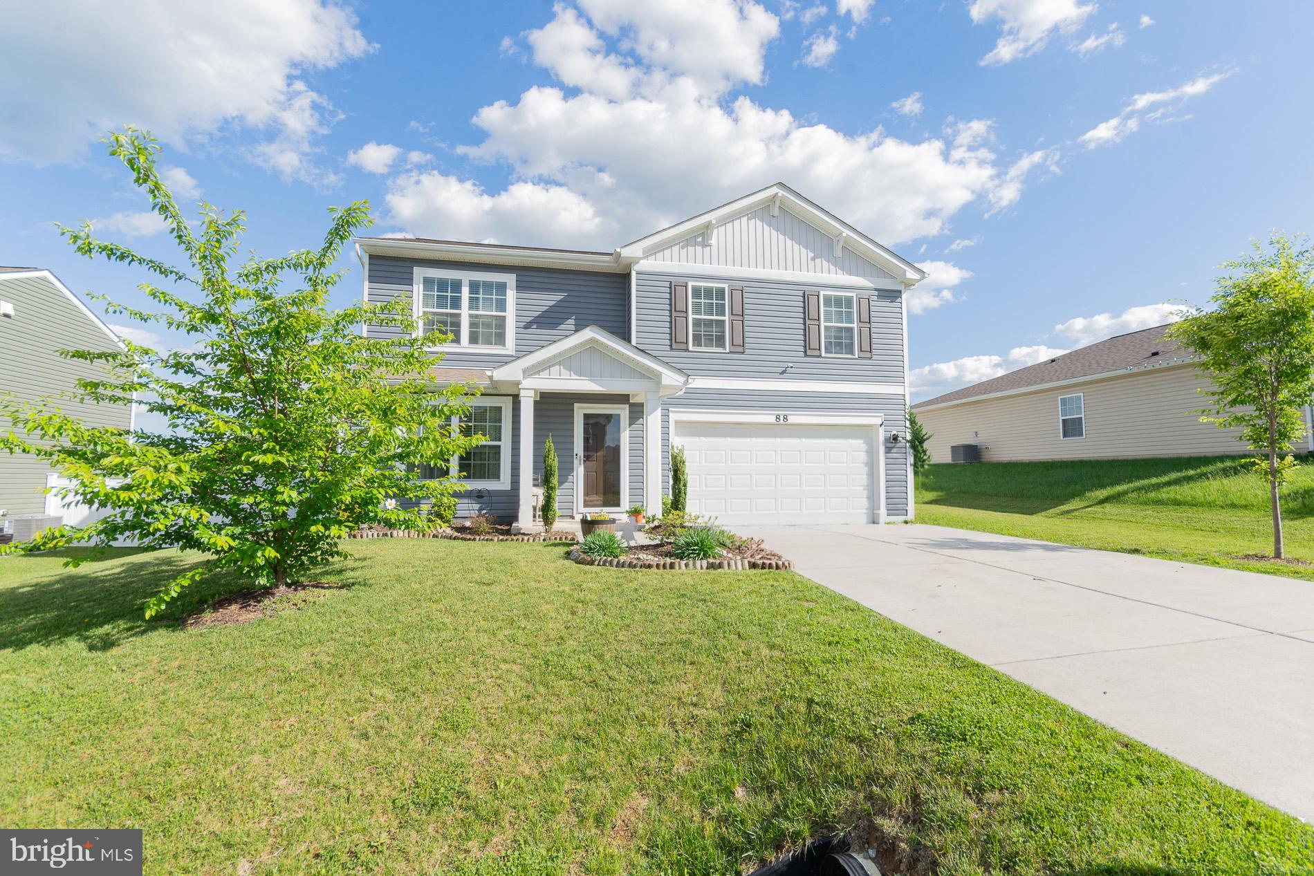 Welcome to this beautiful 2021-built home in the sought-after Magnolia Springs community in Charles Town. Conveniently located near shopping, restaurants, schools, Hollywood Casino at Charles Town Races, and offering an ideal commuter location for Northern Virginia and Washington, DC.

This spacious home features over 1,700 square feet with 4 bedrooms and 2.5 baths, designed with a bright and open floor plan perfect for modern living. The family room and kitchen flow seamlessly together and showcase luxury vinyl plank flooring, a breakfast bar, stainless steel appliances, granite countertops, stylish backsplash, and pantry storage.

Enjoy outdoor living on the lovely rear deck overlooking the fenced backyard — perfect for entertaining, pets, or relaxing evenings.

Upstairs offers plush carpeting, a convenient laundry room, and a thoughtfully designed layout. The primary suite includes a walk-in closet, double vanity sinks, and a walk-in shower. Three additional bedrooms and a full bath provide plenty of space for family, guests, or a home office.

Additional features include a 2-car garage and a small mechanical/storage area upstairs.

Move-in ready and conveniently located — this home combines comfort, style, and convenience in one exceptional package.