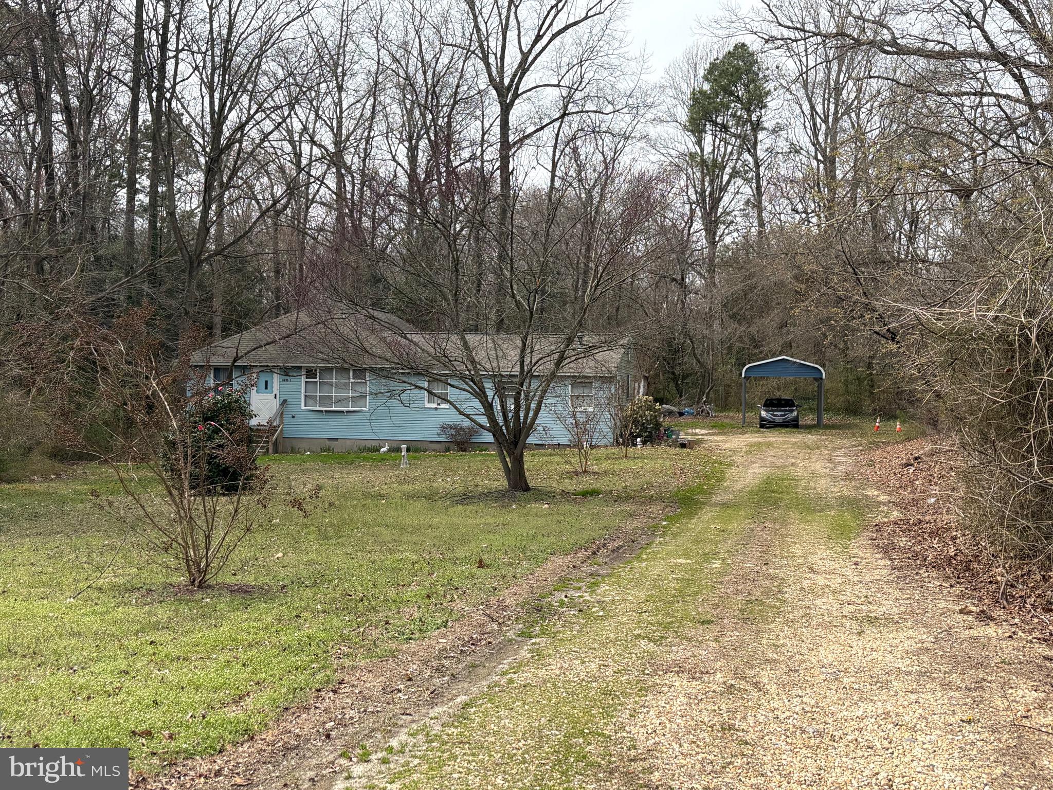 4 bed 2 bath 1 story. Rural area lot with large detached outbuilding-shop-garage. 
Some cosmetic updates needed.