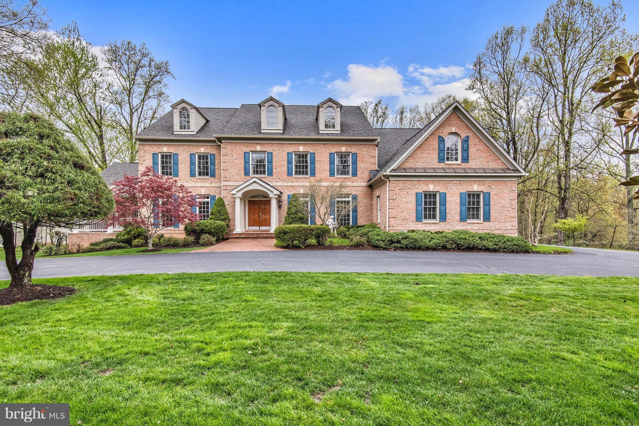 Spacious and private on 3 acres with a circular Driveway, 3-Car Garage, Deck & large backyard. With +8,000 Sq. Ft. interior features Formal Rooms, Sun Room with vaulted ceiling & doors to the front Porch. A two-story Family Room has soaring windows & fireplace. Kitchen with new appliances. Upper Level with 3 Ensuites and Mater Suite with Walk-in Closets & Bath. Walk out Lower Level has Recreation Room, Kitchenette, Fitness Room, Bedroom and Full Bath