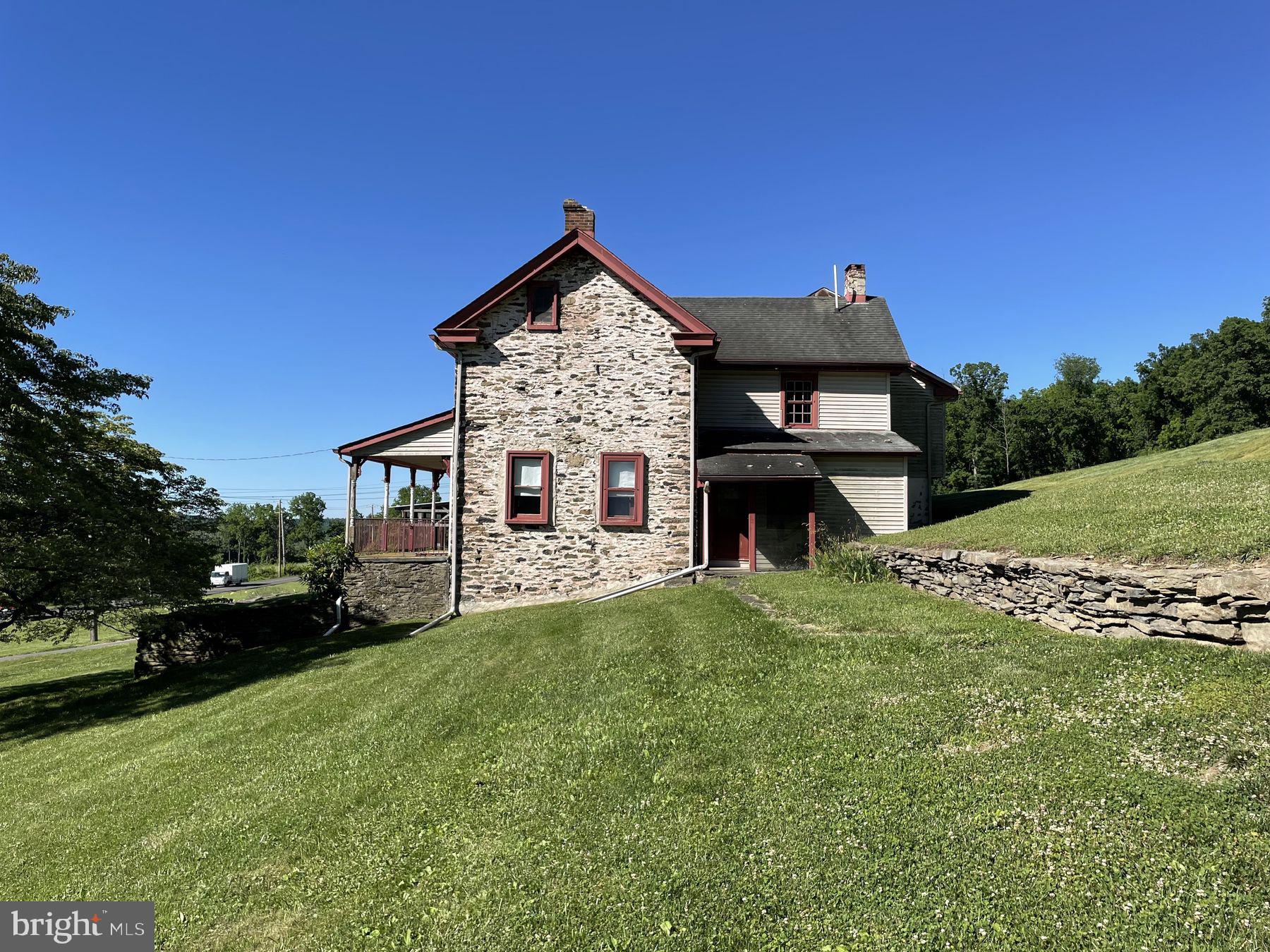 Offering over 22+ acres of open farmland surrounded by expansive open farm fields, these exceptional parcels present the opportunity to create an estate in one of Plumstead Township’s most beautiful rural settings. For those who want to engage in agriculture, equestrian sports, or want to live with an awareness of the natural environment, both parcels are enrolled under Pennsylvania’s Clean and Green Program (ACT 319), which maintains the scenic natural character of the area while offering favorable tax benefits. With two parcels, one with an original 1800’ era stone farmhouse and barn, which can be restored, the other to build a custom estate home with expansive views, the opportunities are within reach to create a rare and unique property. Both parcels have permits in place to construct traditional sand mound septic systems that allow construction to begin without delay. Both parcels are under separate Deeds. Once restored the original stone farmhouse can be a home for family members, or rented, the barn can serve a multitude of uses related to agricultural or, once renovated for stabling horses. This peaceful rural setting is complemented by exceptional convenience, located just minutes from the historic borough of Doylestown’s vibrant town center, known for its restaurants, museums, and cultural destinations. It is a perfect balance of privacy, open space, and convenience. For a buyer who wants this once-in-a-generation opportunity to create and live in harmony with the natural environment, close to all conveniences, with the ability to have productive investment in the land and buildings, this is that property.