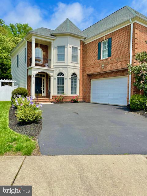 Situated on a 8,004 sqft lot with 5,423sqft of living space, this Kingsport home is one you don't want to miss! As you enter the home, you can immediately tell it has all the finishes you've been looking for-from the gleaming hardwood floors & 9ft ceilings to custom crown molding & plantation shutters. The main level features a parlor, formal dining room, two story family room, powder room & a bonus room that can serve as an office, play room or the choice is yours! Recently upgraded custom kitchen with soft closing, honey maple Wellborn Cabinets, granite countertops, a large center island & pantry. Updated appliances which include a Bosch gas cooktop with a safety gas turn off feature, double wall oven, refrigerator & dishwasher. Off the kitchen is the open, two story family room with a gas fireplace & wall of windows which provides tons of natural light. Main level laundry room with sink & extra storage cabinets. 2 car attached garage with convenient interior access off kitchen. Upstairs you will find the beautiful primary suite which features a coffered ceiling, double closet & en suite bathroom. Enjoy your mornings & evenings on the private balcony off the primary suite. In addition, the upper level features a loft overlooking the family room, 3 large bedrooms each with its own walk in closet & one having an ensuite bathroom. The nearly fully finished basement adds even more living area to this home with 9ft ceilings, a full bathroom and tons of opportunities to use the space as you need: toys, in home gym, 5th bedroom, in home movie theatre-the list goes on! Unfinished section of basement is heated & air conditioned- perfect for extra storage & workshop. Fully fenced in, private backyard with paver patio, beautiful landscaping & sitting area under a pergola. The community of Kingsport offers an in-ground pool, two playgrounds, walking/jogging trail & water access to Crab Creek with a kayak launch.  This home is conveniently located minutes from downtown Annapolis and easy access to Rt 50 and 97. VA Assumable loan at 2.625% rate-call for more details!