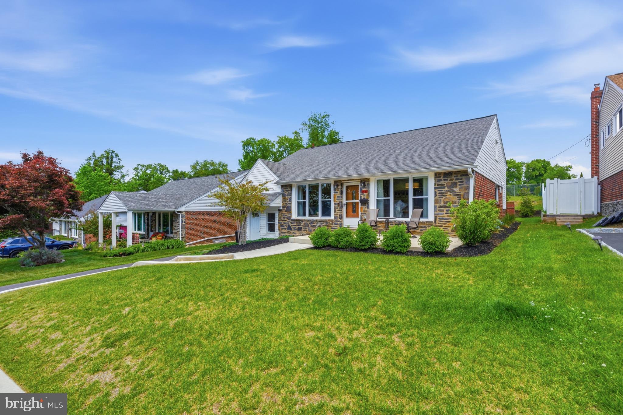 Welcome to this beautifully renovated split-level home where style, space, and functionality come together seamlessly. Filled with natural light from an abundance of windows, the open-concept layout creates a warm and inviting atmosphere throughout.
The upper level features a spacious primary suite complete with a walk-in closet, convenient in-suite washer & dryer, and an updated full bathroom, creating the perfect private retreat. Three additional generously sized bedrooms and another full bathroom with tub provide plenty of room for family and guests.

The versatile lower level offers endless possibilities  featuring its own separate entrance — ideal for a home office, in-law suite, or nanny quarters. An additional full bathroom, laundry room, full kitchen with direct access to the expansive fenced backyard and brand-new concrete patio, offer the perfect setup for entertaining, relaxing, or enjoying outdoor living.

Additional major upgrades include a  2020 main roof and 2024 rear roof, 2023 HVAC, 2023 Hot Water Heater, 2024 Sewer line, offering added peace of mind for years to come. Completing the property is a 2024 back patio,  driveway and walkway, adding both curb appeal and convenience.

This move-in-ready home is a rare opportunity offering comfort, flexibility, and modern updates throughout.