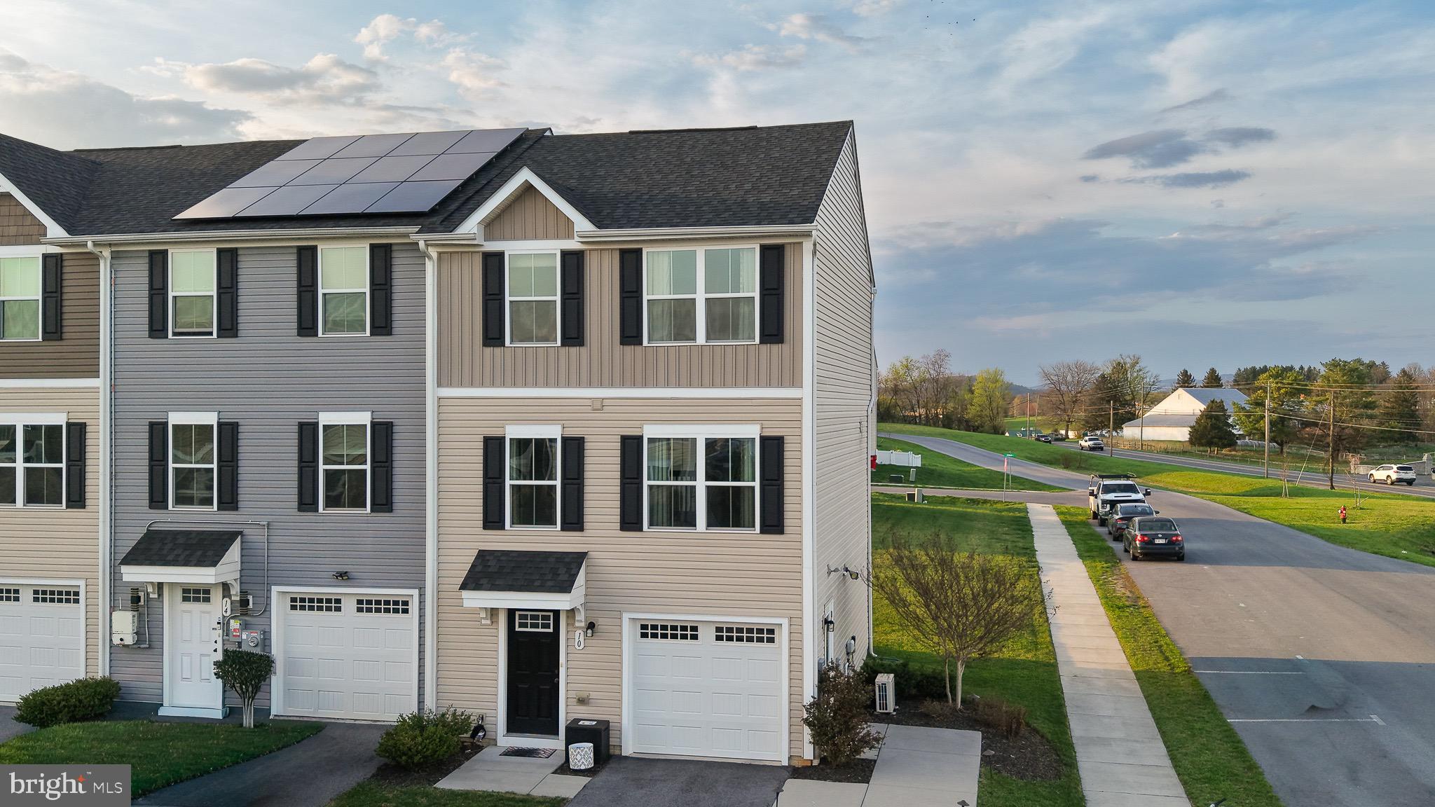 Welcome to this stunning 3-bedroom, 2.5-bath townhouse, originally the model for the community. Built to impress, the home is packed with model home finishes, including an open floor plan, black cabinetry, and a trendy grey color scheme throughout. The layout is perfect for entertaining, with a large, inviting living area and a generous main bedroom. Lots of natural light throughout the home! 

Outside, the home stands out from the rest of the neighborhood. It features a private side-door entrance directly to the garage and a custom exterior lighting. Maintenance is effortless thanks to the automated lawn sprinkler system, keeping your curb appeal at its peak year-round.

The garage itself is a unique room. Having served as the model's office, it is finished with independent air conditioning and extra light fixtures. Whether you need a temperature-controlled hobby space or a professional home office, this unit offers flexibility rarely found in a townhouse. Meticulously maintained and move-in ready! Come see it before it is gone!