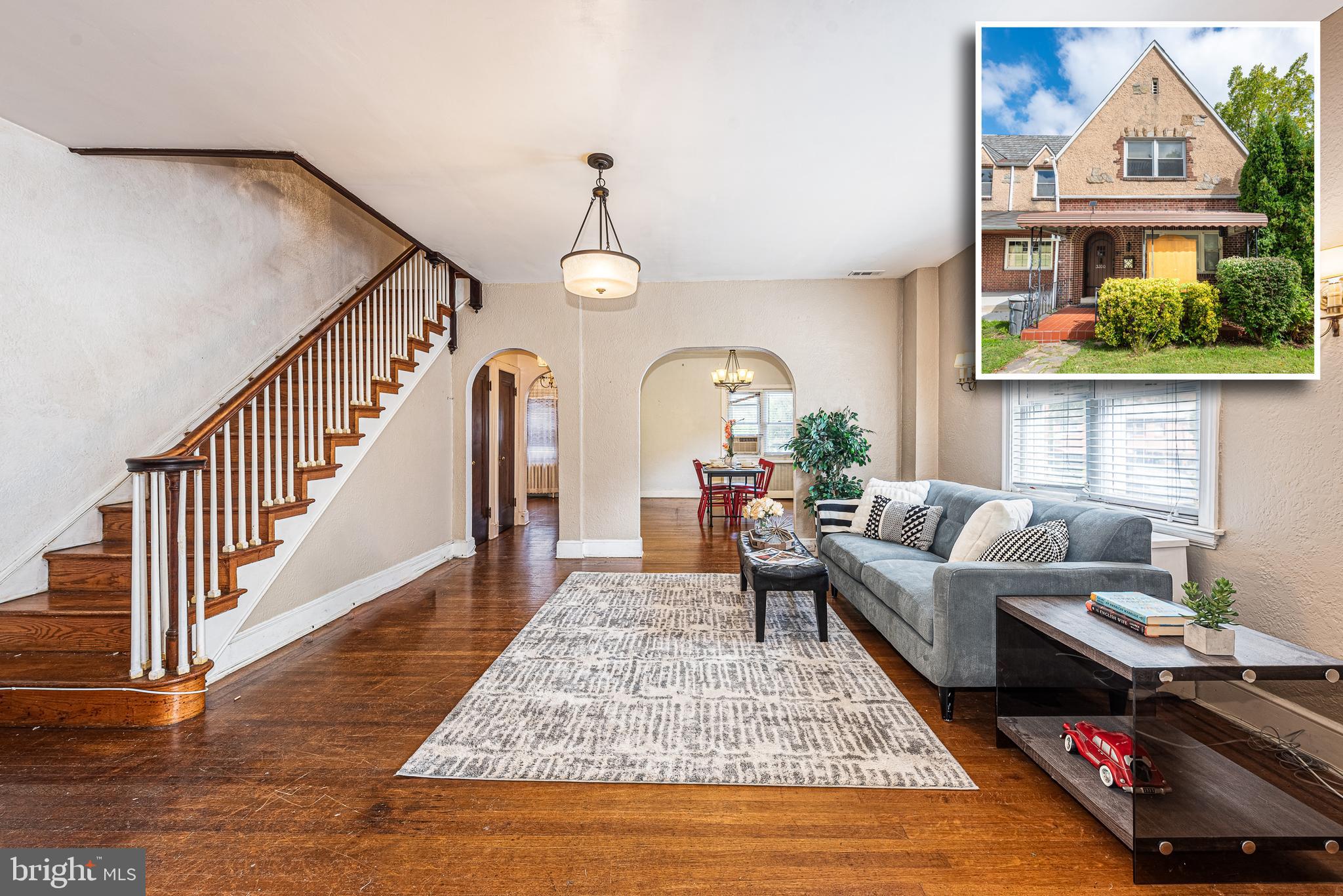 SIMPLY CHARMING & SPACIOUS END OF GROUP ROWHOME WITH OVER 1,900 SQ FT. OF LIVING SPACE!  Features include hardwood flooring throughout, a main level with a sitting room, an inviting living room, a separate dining room, and a kitchen with ss appliances, upper level with 3 generously sized bedrooms and 1 full bath along with a 2nd level deck, a finished basement with a family room, half bath, and storage space.  Pack your bags and move right in!