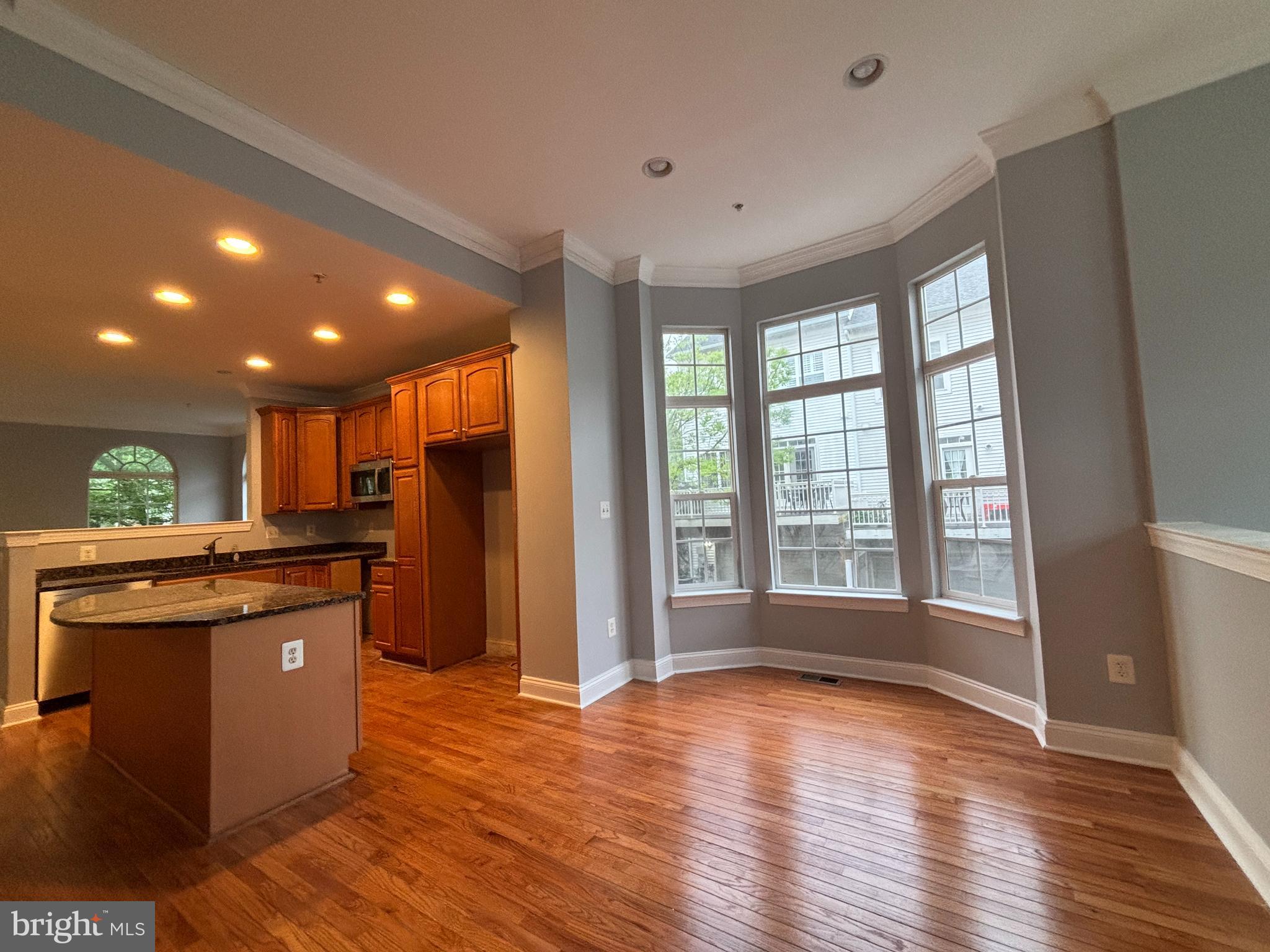 A beautiful, classic and contemporary combine, with sunlit in all rooms. High Ceiling, Crown Mouding, HWF and brandnew elegant vinyl flooring.Undated lighting and freshly painted by Evening Shadow Sherman Williams painting thorugh out all rooms in three floors. Gas heat, gas cooking(new appliances). The country kitchen flows to the high celing family room and dining area, open to a small but airy balcony.
The kitchen countertop and its island are elegantly dressing up with granite tops.

Easy walk to Wims Elementary and Piedmlont Woods Local Park with baseball and tennis courts, picnic areas, trails and a dog park!

New oak staircase leading to second floors. Master bedroom has a huge Master bant, large, elegant , sunny and airy. 
Basement is completely finished with a large recreational room with fireplace a full bath with tub and the 4th bedroom. Access to a little yard to the 2 car garages. It has 2 little gate opens to street and to garage.
