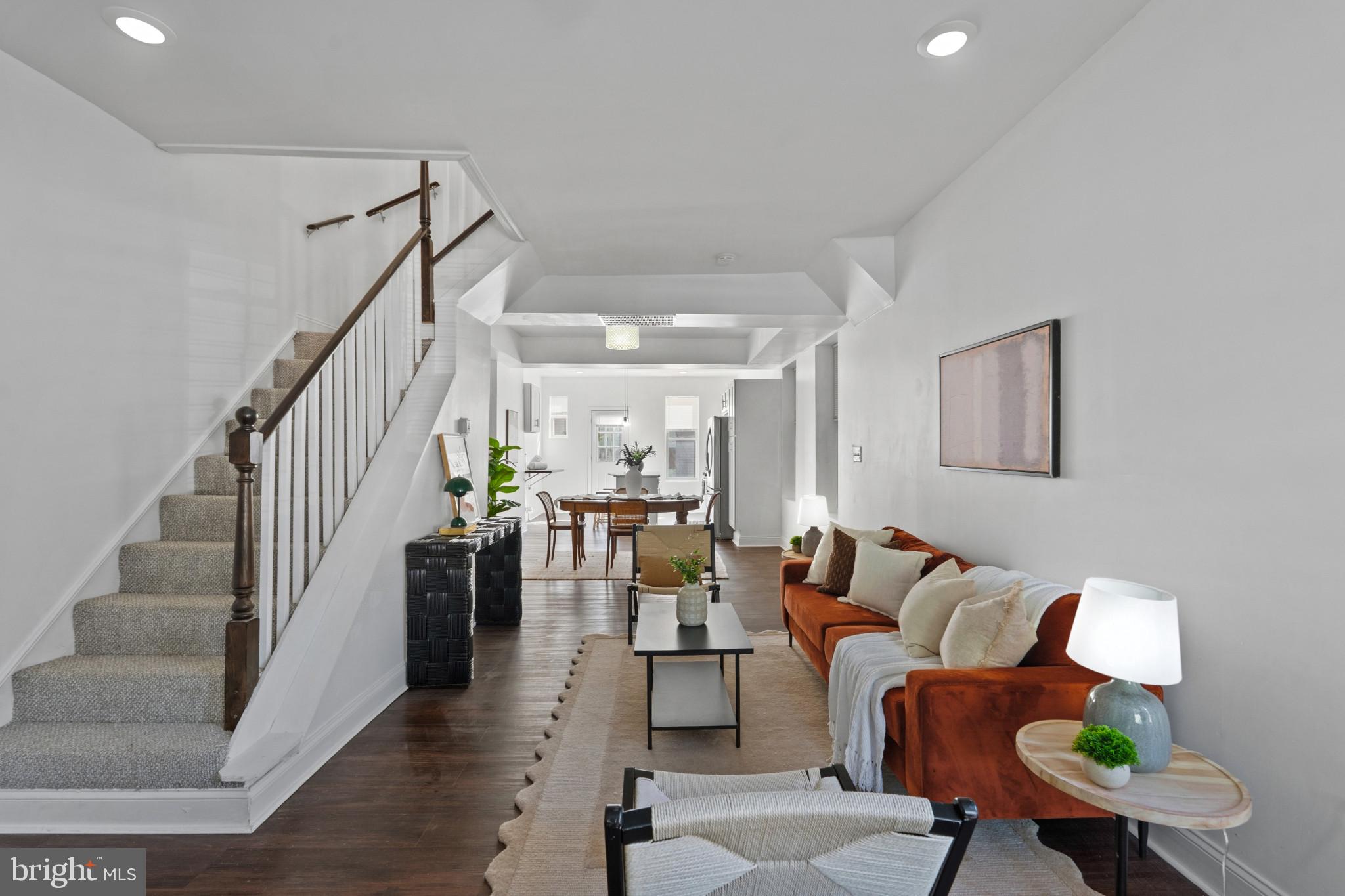 Welcome to the perfect blend of space, style, and value in Baltimore's desirable Greenspring community. This beautifully renovated end-of-group rowhome offers everything today's buyers are searching for—three spacious bedrooms, three full bathrooms, private parking for two vehicles, and multiple outdoor living spaces, all at an incredible price point under $250,000!

Step onto the oversized covered front porch, the perfect place to enjoy your morning coffee, greet neighbors, or unwind after a long day. Inside, you'll find a thoughtfully updated interior featuring fresh finishes, modern upgrades, and a versatile floor plan designed for everyday living and entertaining. The spacious living areas flow seamlessly into the updated kitchen, while the three full bathrooms provide comfort and convenience rarely found at this price.

Out back, enjoy a private rear deck ideal for summer barbecues, outdoor dining, or simply relaxing in your own outdoor retreat. The end-of-group location provides additional natural light and added privacy, while the off-street parking for two vehicles eliminates the hassle of city parking.
Whatever you needs are, this home checks all the boxes. Affordable, updated, and packed with features that are difficult to find in this price range, this is a rare opportunity to own a turnkey home in a convenient Baltimore location close to major commuter routes, shopping, parks, and everyday conveniences.

Why settle for a rental when you can have a fully renovated home with parking, outdoor space, and room to grow at a great price? Schedule your showing today.