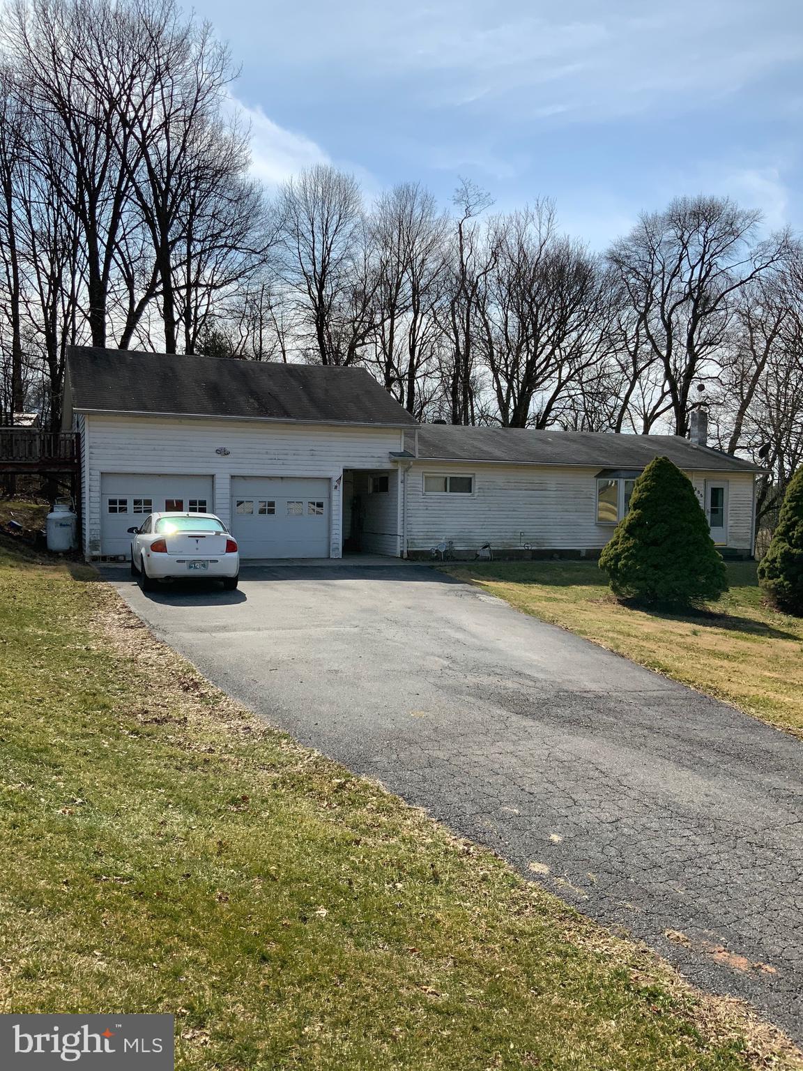 Littlestown Rancher on 2.4 acres close to MD line. Home needs lots of TLC. Possible cracked beam under house and some mold growth visibly spotted in Laundry area ceiling and  on main floor bathroom ceiling. Also possible mold in crawl space area but not verified. Seller is POA and will not make any repairs. Home is sold  "as-is".Highly recommended that buyer uses due diligence and completes inspection on home and septic and possible mold issues. Inspections for buyers and informational purposes only.