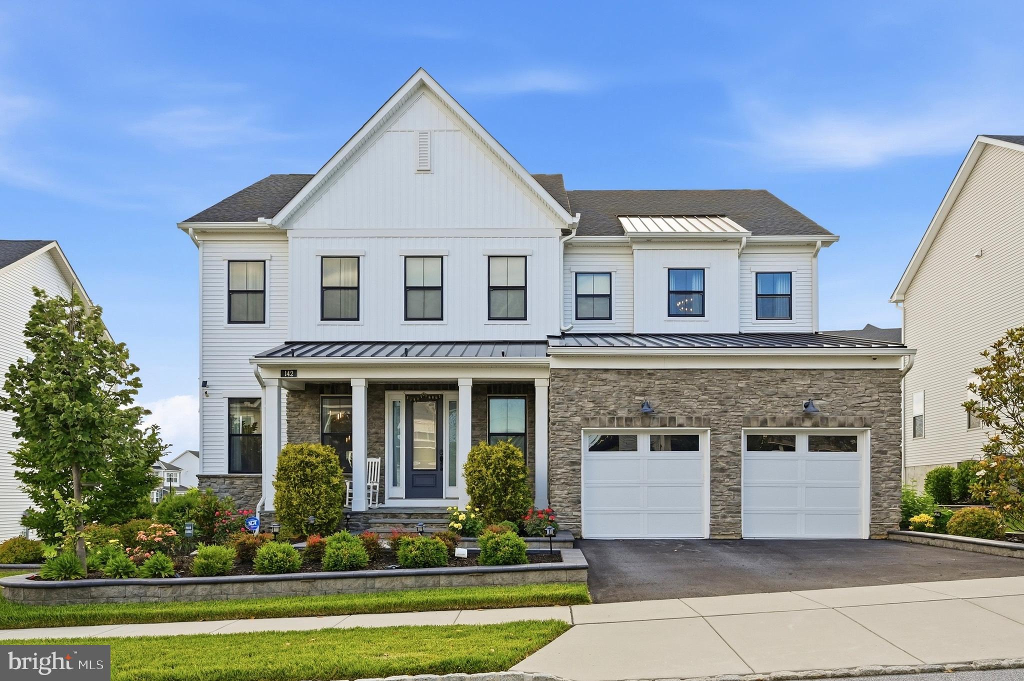 Experience refined luxury in this exceptional east-facing former Toll Brothers model home located in the prestigious Chester Springs Crossing community, served by the highly acclaimed Downingtown Area School District. Showcasing over $500,000 in designer upgrades and premium model-home finishes, this residence blends elegance, comfort, and modern functionality across three beautifully finished levels plus a walk-out lower level.

A dramatic foyer opens to an expansive, light-filled main level featuring 10-foot ceilings on the first floor, creating an elevated sense of space and grandeur. The main level also includes extensive custom millwork, designer wall treatments, a formal dining room, a study room, and a spacious great room designed for both everyday living and entertaining. The expanded gourmet kitchen is a true centerpiece, offering a waterfall-edge island, premium cabinetry,  pantry room, breakfast area, and seamless flow into the family room.

A main-level bedroom with a full bath provides ideal flexibility for guests or multigenerational living. Upstairs features 9-foot ceilings and a luxurious owner’s suite serving as a private retreat with dual walk-in closets and a spa-inspired bath, complemented by three additional generously sized bedrooms. 

The professionally finished walk-out basement also features 9-foot ceilings, expanding the living space with a large recreation area and versatile bonus room suitable as a sixth bedroom, gym, or office. Outdoor living is equally impressive, featuring a stone fireplace, built-in grilling station with bar seating, multiple entertainment areas, professional landscaping, irrigation system, and landscape lighting—creating a private resort-style setting. Refrigerator, washer, and dryer are included, along with all furniture except the living room sofa

Additional highlights include whole-home audio, extensive architectural upgrades, and a two-car garage. A rare opportunity to own a fully appointed luxury model home in one of Chester Springs’ most desirable communities.