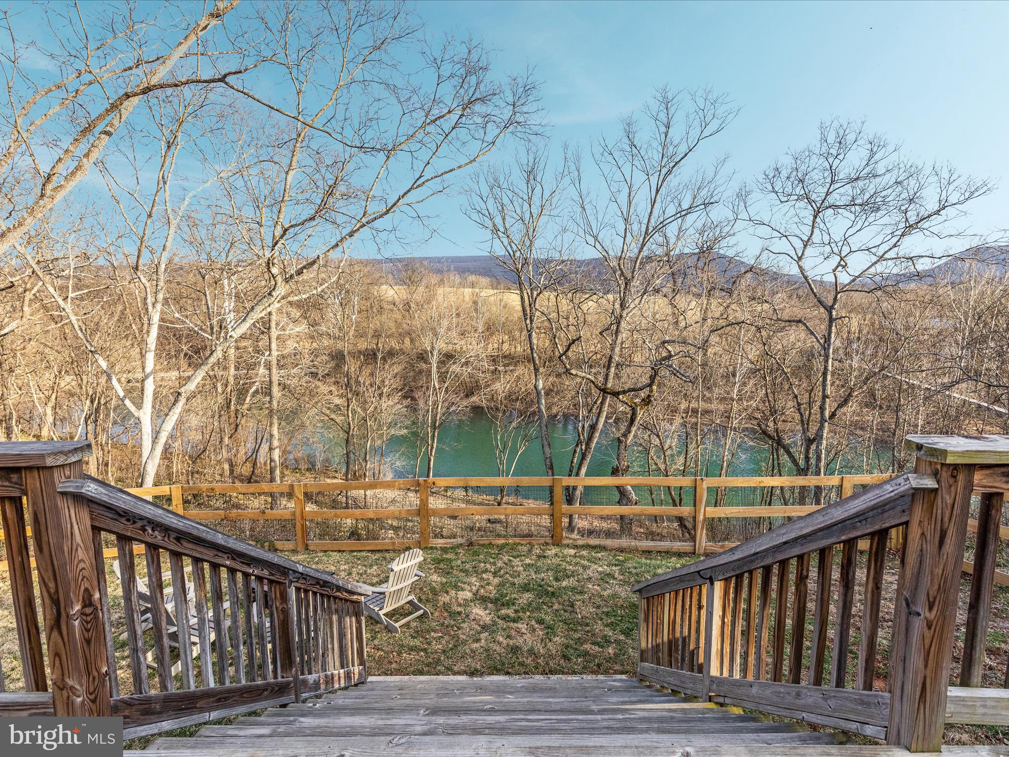 SHENANDOAH RIVERFRONT – NO RESTRICTIONS! OUT OF FLOODPLAIN!

Enjoy direct river access with this charming rancher on 0.64 acres (see additional small parcel), perfect for fishing, swimming, kayaking, and tubing right from your backyard. With no HOA or restrictions, you have the freedom to make this riverfront retreat truly your own. Enjoy knowing that your home is close to the river, but out of the floodplain. 

This 1,310 sq. ft. home features 2 bedrooms, 2 full baths, and a cozy wood-burning fireplace. Relax on the screened porch, grill on the spacious decks, or unwind in the hot tub while taking in the peaceful surroundings. A 160 sq. ft. basement provides extra storage. The owner installed a brand new septic system. 

Located near top outdoor destinations, including hiking trails, ski resorts, caverns, mountain biking, ATV trails, and renowned wineries, this home offers adventure at your doorstep.

Don’t miss this rare opportunity for unrestricted riverfront living—schedule your private tour today!