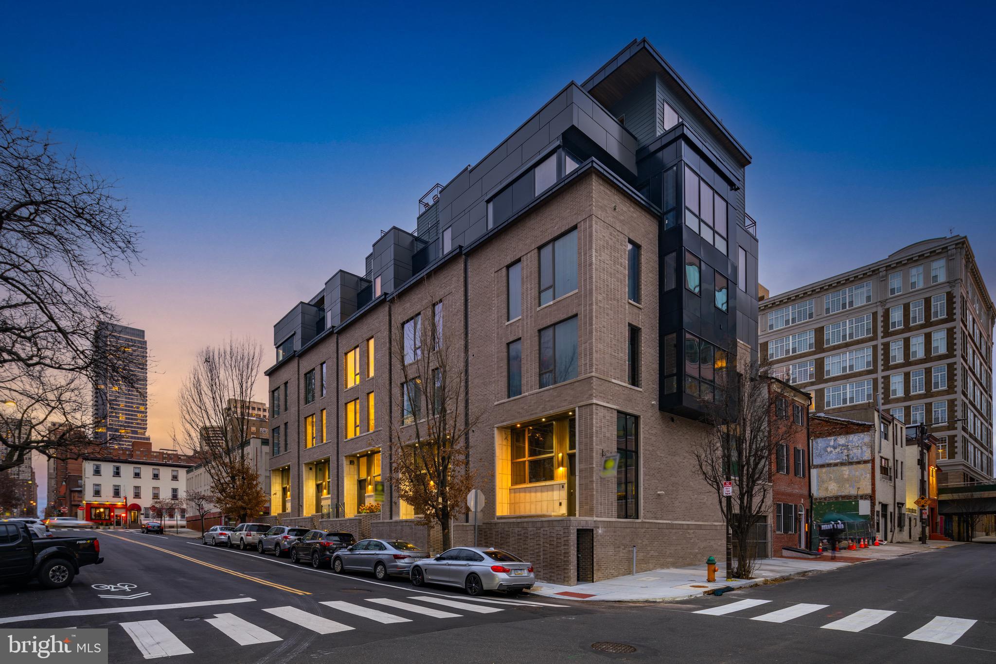Introducing the Sansom 5 - a luxurious enclave in Rittenhouse Square which is comprised of five meticulously crafted homes in one of the city's most tranquil corners. Each residence has been thoughtfully designed to redefine contemporary urban living and stands as a testament to comfort, opulence, and meticulous attention to detail. 

Every townhome within Sansom 5 epitomizes a work of art, featuring four bedrooms, four full bathrooms, three half bathrooms, a two-car garage, a six-stop elevator, lofted flex space, top floor club room, multiple outdoor areas, and sprawling over 5,200 square feet. Notably, each home offers a private roof deck affording immersive views of the city and the Schuylkill River.

Returning to Sansom 5 is a daily delight, with a gated driveway leading to a private two-car garage and an elevator offering access to every floor. The first level presents a gourmet kitchen fit for culinary showcases, an airy living room merging with a dining area featuring 20-foot ceilings and floor-to-ceiling windows leading to a serene patio. A modern floating staircase stands as a focal point.

The gourmet kitchen is an entertainer's dream, equipped with an 8-burner Wolf range, a 48” Sub-Zero refrigerator, Cove dishwasher, and an overly generous island made from a single piece of leathered quartzite.

The second floor holds a spacious guest room with an en suite bathroom and a lofted den with a wet bar and half bath. Ascend to the third floor where you'll find two guest rooms, each featuring custom en suite bathrooms and walk-in closets. 

The fourth floor is dedicated to the luxurious owner’s suite, your personal retreat, with a stone-wrapped fireplace, a vast walk-in closet, private balcony, and the most incredible spa bathroom that encourages relaxation. Here, you’ll enjoy heated floors covered with custom tile, a large freestanding statement tub, and a walk-in shower with two rain shower heads, body sprays, a 13-foot ceiling with a skylight that showers you with water and natural light! Here you have the option to customize your home and choose between a light and bright bathroom or a dark and moody option.

Up on the fifth floor you'll find an incredible bonus room that is equipped with a half bathroom and wet bar. There are also two outdoor spaces on this level. The sliding doors on the front open up to a deck that boasts incredible city views and is structurally supported for an optional hot tub. The rear glass door opens up to a private balcony that leads to a spacious roof deck, providing unique 360° views of Center City, the Schuylkill river, and University City.

Sansom 5 is ideal for families because it's perfectly located less than one block away from Greenfield Elementary School and a few blocks away from The Philadelphia School.  And to make life more enjoyable, your new home is just steps away from Rittenhouse Square and all of the wonderful shopping on Walnut Street, The Schuylkill River Trail, and some of the most delicious eateries in the nation, such as Vernick’s Food and Drink, James Beard Winner - Friday, Saturday, Sunday, Ambrosia Ristorante, Parc, and Rouge just to name a few.

Every detail in all five of these homes has been carefully considered and meticulously executed, with a level of craftsmanship and attention to detail that is simply unparalleled. These homes are a testament to the finest that luxury living has to offer, and are sure to make you want to call one your own. Don’t miss this once-in-a-lifetime opportunity to live in one of Philadelphia’s most coveted locations in style and luxury!