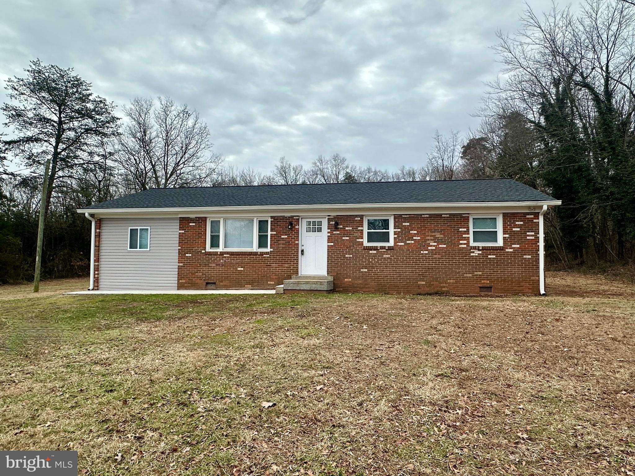 OPPORTUNITY KNOCKS in the fast growing District of Culpeper County! Zoned H-1 (Heavy Industrial) with Culpeper County Zoning permitting a variety of uses. This 1.98 acre property, with easy access to US-29/15 features a 3 bedroom, 2 bath single family detached residential dwelling built in 1969 with approximately 1,485 square feet of living area that has been tastefully updated in 2024. New HVAC, water heater and shingles. Home features modern kitchen with new cabinets, stainless steel appliances, stone countertops, LVP flooring, ceramic tile in both full bathrooms, new washer and dryer. New light fixtures and ceiling fans throughout the home along with fresh paint. This location offers many amenities in the area such as shopping, restaurants, schools, wineries, breweries. No HOA.
Please refer to the Culpeper County Zoning Ordinance for more specifics on potential uses and consult with the county.