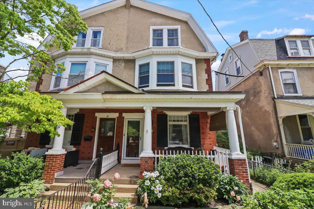 Welcome to 18 W Gravers Lane, a spacious 5-bedroom, 2.5-bath semi-detached twin in the heart of Chestnut Hill that perfectly blends classic character with modern updates. Situated on a picturesque block just steps from Germantown Avenue, this home offers both charm and convenience in one of Philadelphia’s most sought-after neighborhoods.  From the moment you arrive, you’re welcomed by a charming front porch that sets the tone for this warm and inviting home. Inside, beautifully refurbished hardwood floors and high ceilings create a bright, airy atmosphere throughout. The first floor features a cozy living room that flows seamlessly into a spacious dining room, ideal for both everyday living and entertaining.  The renovated kitchen is thoughtfully designed with stylish cabinetry, granite countertops, stainless steel appliances, a center island, and abundant storage and workspace. Just off the kitchen, a convenient mudroom provides first-floor laundry, a half bath, and access to the private backyard oasis featuring a new paver patio.  The second floor offers three well-appointed bedrooms and a beautifully renovated hall bathroom. The third floor features two additional sun-filled bedrooms, a full bathroom, and a bonus room that serves as the perfect flex space for a home office, cozy den, exercise room, or dressing area.  The basement is clean, well maintained, and provides ample storage space. Ideally located within walking distance to Chestnut Hill’s shops, restaurants, parks, and public transportation, this home offers the perfect combination of timeless character, thoughtful updates, and an unbeatable location.  Come see this home today!