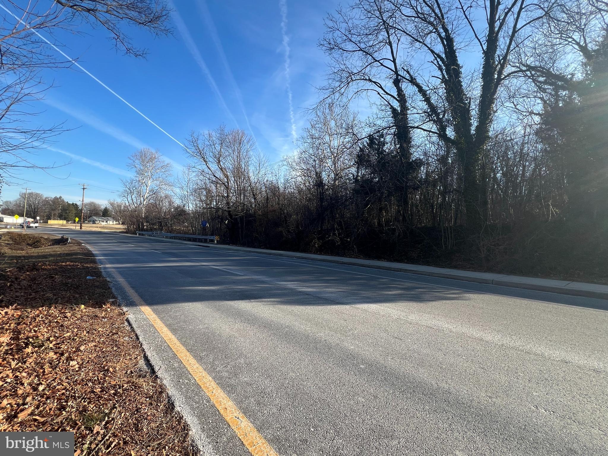 1.9 acres located in the Town of North East, Maryland!   This unique lot offers convenient access to downtown North East, with all of its charming shops and restaurants that are only a short walk from home.  Don't forget the waterfront, North East Park for walking, picnicking, fishing, and watching fireworks in the summer with a short walk home!  Located with in the town limits this property offers 1.96 acres of seclusion and privacy.  Town living in a country setting!  Imagine your new home or possibly your new home and cottage business and all the beauty of nature, including a beautiful stream, while still in the amazing town of North East!  The Town of North East has started the process to change the zoning on this property to VILLAGE COMMERCIAL.  This is truly a one of a kind opportunity!   Public water and sewer hook up are available for this property, so no well drilling and septic approval hassles to go through.   Don't miss your opportunity to build your dream home on this property.