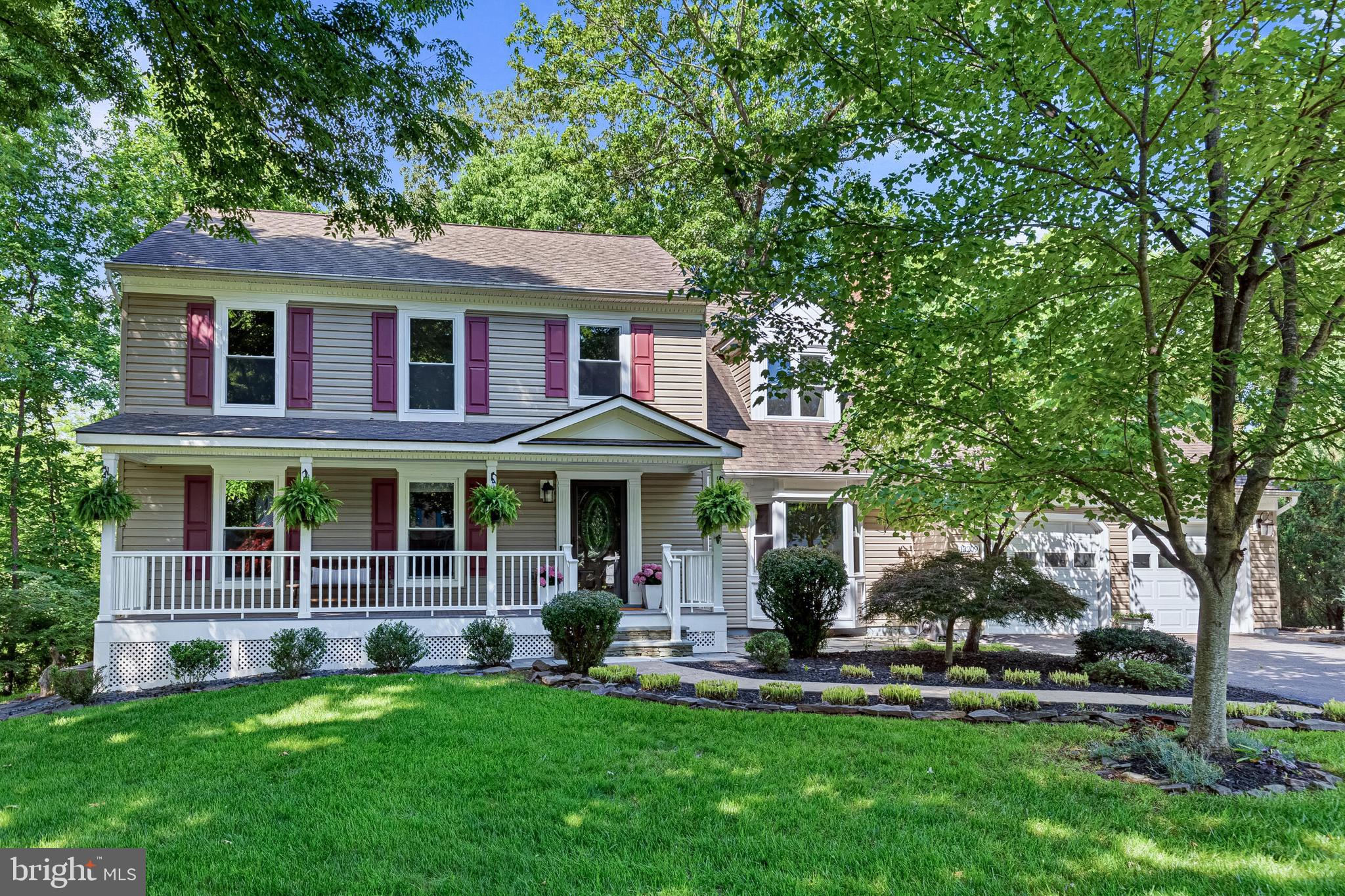 Tucked away on a private drive in sought-after Franklin Glen, this beautifully maintained home offers timeless curb appeal, a peaceful wooded setting, and over a half-acre of space to enjoy. The inviting front porch, renovated in 2023, creates a warm welcome and sets the tone for the thoughtful updates and care found throughout the home.
Inside, the main level features custom molding, a spacious living room, separate dining room, and a comfortable family room with fireplace just off the kitchen—ideal for both everyday living and entertaining. The kitchen offers white cabinetry, granite countertops, stainless steel appliances, pantry storage, and a charming eat-in area with a built-in bench framed by a sunny bay window. Step outside to the deck overlooking the private wooded backdrop for the perfect outdoor retreat.
Upstairs, the spacious primary suite features a vaulted ceiling, walk-in closet, and a newly remodeled spa-inspired bathroom (2026). Three additional generously sized bedrooms and an updated full bathroom complete the upper level.
The walkout lower level offers a large rec room with new carpet (2026), a wet bar and full bathroom, abundant flexible living space, and a dedicated workshop area with venting—perfect for hobbies, projects, or additional storage.
Additional highlights include a two-car garage, move-in ready condition, and major exterior updates including the roof, siding, and windows replaced within the last 15 years.
Located in the highly desirable Franklin Glen community with a pool, tot lot, and year-round neighborhood activities, this is the perfect blend of privacy, community, and convenience.