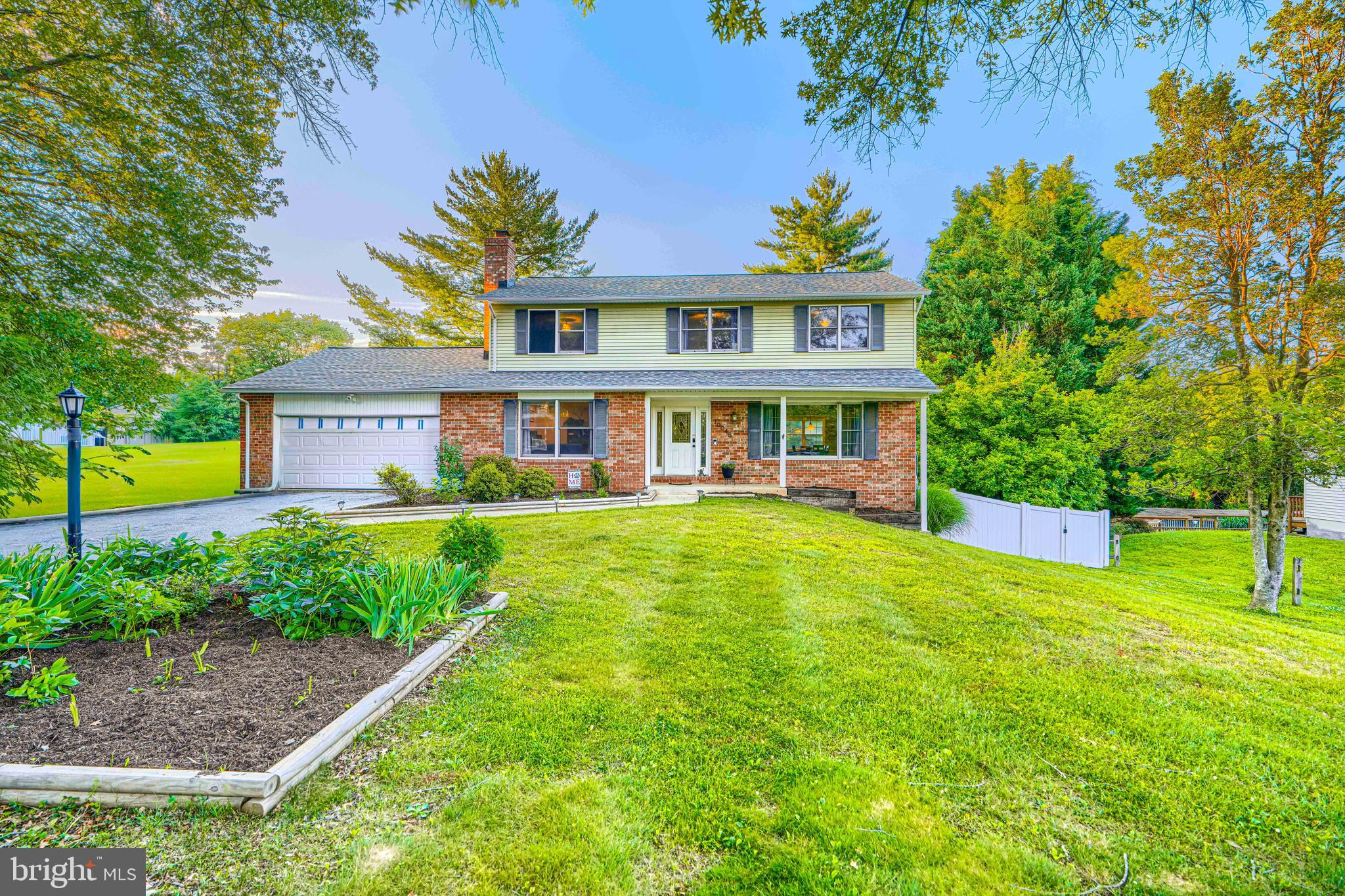 Welcome to 10048 Century Drive, a beautifully updated three-level colonial ideally situated on a private, wooded 0.75-acre lot in the highly sought-after Centennial school district of Ellicott City. This spacious home offers 5 bedrooms, 3.5 bathrooms, and over 3,000 square feet of finished living space, thoughtfully improved with modern updates throughout. Recent renovations include refreshed bathrooms, new LVP flooring on the upper level and basement, and a fully finished walk-out lower level designed for versatile living and entertaining. Fully fenced back yard is a dream, with multiple gardening locations, stone sitting area, and expansive open space.

The main level features gleaming hardwood floors, a bright and inviting living room, a formal dining room with classic chair rail detailing, and a comfortable family room centered around a cozy fireplace. The kitchen is equipped with ample cabinetry and a convenient breakfast area that opens to a covered deck overlooking peaceful wooded views—perfect for relaxing or entertaining outdoors. Upstairs, you’ll find four generously sized bedrooms and two fully renovated bathrooms, including a spacious primary suite with a walk-in closet.

The recently finished walk-out basement expands the living space with a large recreation room, a fifth bedroom, and a full bathroom, ideal for guests or extended living.  Move-in ready and impeccably maintained, this home combines modern updates, functional space, and a premier location—an exceptional opportunity in Ellicott City.
