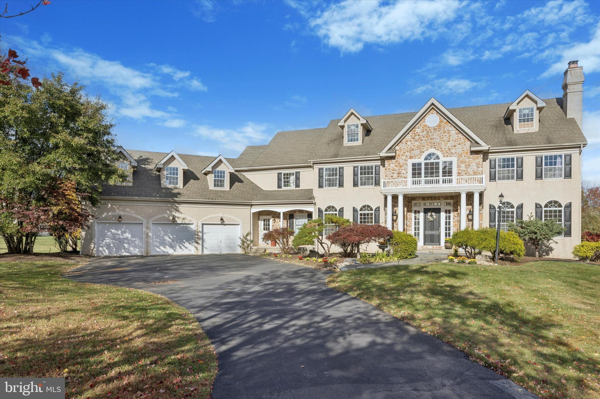 Welcome to 2501 Pondview Drive, a distinguished former model home by renowned Sparango Builders, nestled in the sought-after Worcester Township. Perfectly situated just a stone’s throw from Blue Bell Country Club, Normandy Farm, and Center Square Shopping Center, this location offers both prestige and convenience.

Set on a tree-lined cul-de-sac with only seven custom residences, this Helmsly Model showcases over 5,700+ square feet of elegant living space on a 1.87-acre flat corner lot. The home features 5 spacious bedrooms, 3 full baths, 2 half baths, a 3-car garage, and a large unfinished basement ready for your personal touch.  Step inside this exceptional residence  with beautifully finished living space, designed for comfort, sophistication, and everyday elegance. The grand two-story foyer, featuring tiled floors and a sweeping curved staircase, makes a stunning first impression. To the right, the bright and inviting living room showcases four arched windows that fill the space with natural light and a cozy gas fireplace that adds warmth and charm. French doors open to a spacious study overlooking the picturesque backyard—perfect for working from home or relaxing with a good book.

To the left of the foyer, the formal dining room, framed by elegant arched windows, provides an ideal setting for hosting family gatherings and dinner parties. The open-concept family room serves as the heart of the home, featuring a dramatic floor-to-ceiling stone fireplace and seamless flow into the gourmet kitchen and breakfast area.

The kitchen is a chef’s dream, highlighted by rich granite countertops, an expansive island with a prep sink, double wall ovens, and custom cabinetry offering generous storage. A writing nook provides added functionality, while large windows above the sink frame beautiful views of the backyard. The breakfast area opens to an expansive deck—ideal for outdoor entertaining and quiet mornings alike. Completing the main level are two powder rooms, a convenient back staircase, a secondary front entry, a large laundry room, and access to the three-car garage.

Upstairs, the grand primary suite is a private retreat featuring a tray ceiling, a luxurious walk-in closet with custom organization and a private balcony, and a spa-inspired ensuite bath complete with a jetted soaking tub, walk-in shower, and dual vanities. Four additional spacious bedrooms include two sets of Jack-and-Jill bathrooms, offering comfort and convenience for family and guests. A 16’ x 32’ bonus room above the garage provides flexible space that can serve as a fifth bedroom, recreation room, media room, or private study.

A pull-down staircase leads to the floored attic, offering abundant storage or potential for future finished living space. The lower level features a 2,100+ sq. ft. unfinished basement—ready to be transformed into the ultimate entertainment area, gym, or guest suite. 

The expansive, flat backyard is a rare find—offering endless possibilities to create your own private oasis. There’s ample space for a future pool, landscaped gardens, play area, or an exceptional outdoor entertaining space. 

Located just minutes from the heart of Blue Bell, this home offers the perfect blend of privacy, convenience and luxury in one of the area’s most desirable communities.  Experience the exceptional lifestyle that awaits at 2501 Pond View Dr.