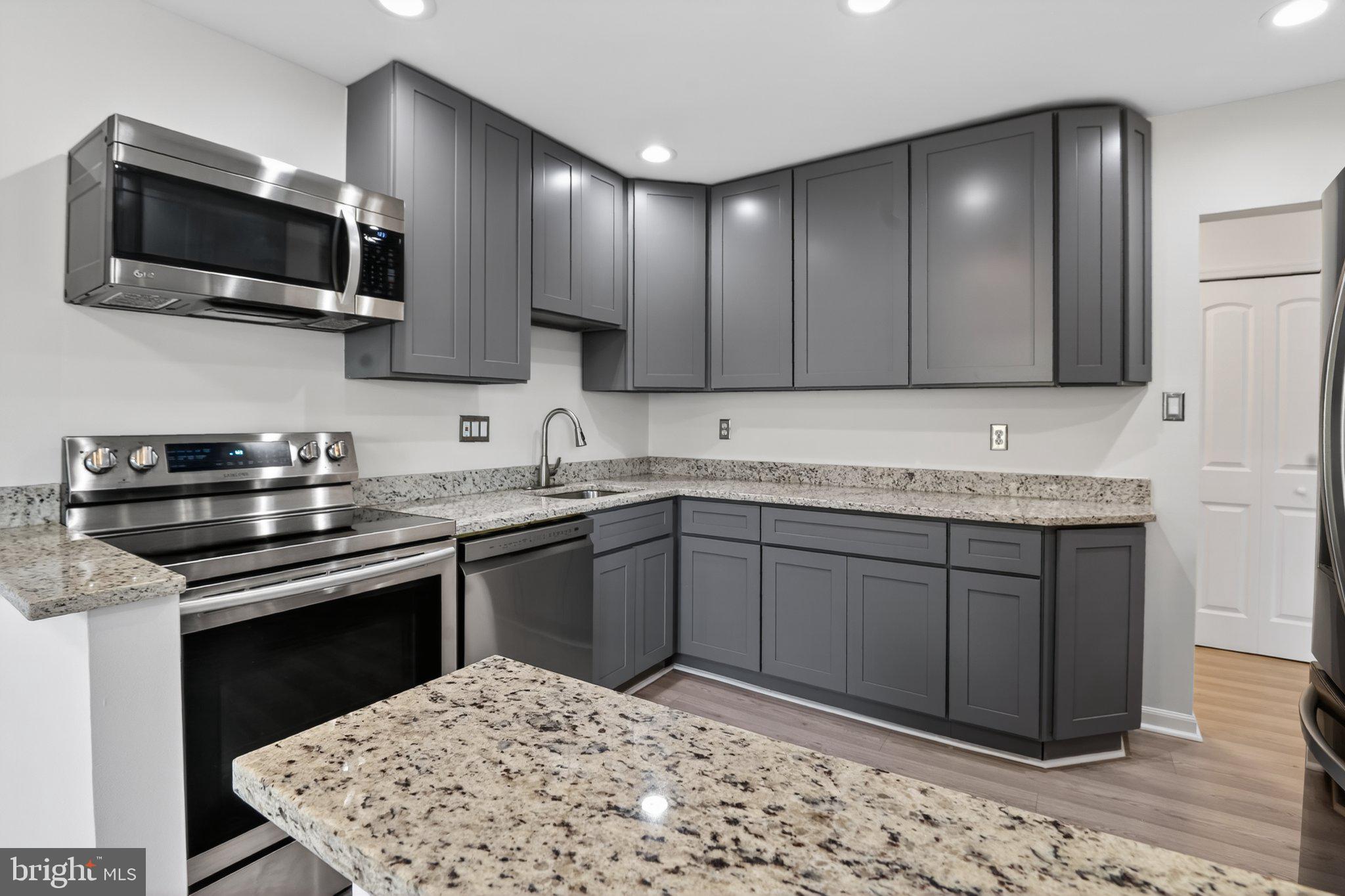 Rarely available quiet top-floor 2-bedroom, 2-bath condo, fully remodeled and move-in ready! Extensive updates include a brand-new kitchen featuring 42" cabinets, granite countertops, upgraded lighting, and new LG stainless steel appliances, including a refrigerator, stove, microwave, and dishwasher, plus new LG ThinQ washer and dryer. Additional improvements include beautifully renovated bathrooms, new waterproof flooring throughout, new interior doors, custom Sherwin-Williams paint, professionally resealed windows, and a custom-built closet system in the primary bedroom.

Condo fees include all utilities except plug-in electricity, as well as access to a large swimming pool, daily trash removal, landscaping, snow removal, and exterior maintenance, providing exceptional value and hassle-free living. The unit comes with two parking permits and one guest parking pass, plus ample free street parking.

Enjoy an unbeatable location just minutes from the Vienna/Fairfax-GMU Metro, I-66, Route 50, and major commuter routes, with easy access to parks, walking trails, and biking trails.