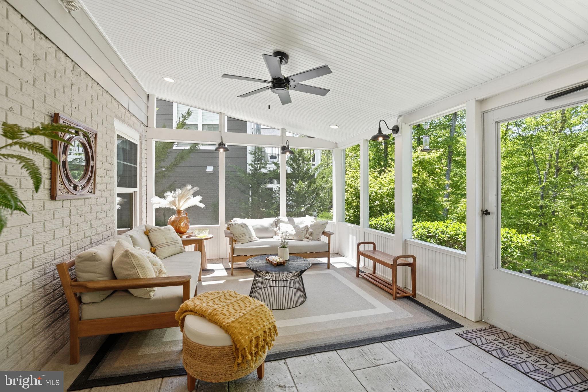 Now offered at $970,000! This beautifully upgraded Brookfield Brighton model offers the perfect combination of luxury, comfort, privacy, and location in sought-after Potomac Shores. Backing to protected trees with peaceful wooded views, this move-in ready 5-bedroom, 4.5-bath home truly stands out with over $75,000 in thoughtful post-build upgrades and exceptional pride of ownership throughout. From the moment you walk in, the home feels like a professionally staged model home—but it isn’t. Every space has been meticulously maintained and thoughtfully designed, creating a warm, elevated feel that buyers will immediately notice. The open and airy floor plan is filled with natural light and features wide plank engineered flooring across the main level, a stunning floor-to-ceiling modern fireplace, custom walk-in pantry, gas cooktop, double wall ovens, and an oversized kitchen island that opens beautifully to the family room and morning room. Step outside and enjoy one of the home’s best features—a large composite deck and screened-in porch overlooking the private tree line, creating the perfect space for morning coffee, outdoor dining, entertaining, or simply unwinding at the end of the day. Upstairs, the spacious primary suite feels like a private retreat with a sitting area, two walk-in closets, and a spa-like bath with soaking tub and oversized shower. The finished walkout basement offers incredible flexibility with a large rec room, full bath, and fifth bedroom ideal for guests, a home office, gym, or multigenerational living. Additional highlights include a finished two-car garage, mudroom, covered front porch, upper-level laundry room, and 5-zone irrigation system. Located just minutes from community trails, Potomac Shores Middle School, Covington-Harper Elementary, the Ali Krieger Sports Complex, and John Paul the Great High School, this home also offers access to the incredible amenities that make Potomac Shores so desirable, including pools, fitness centers, clubhouse, scenic trails, kayak launch, and the renowned Potomac Shores Golf Club featuring the Jack Nicklaus Signature Course and Tidewater Grill. This is the kind of home buyers wait for—beautifully maintained, loaded with upgrades, backing to trees, and located in one of Northern Virginia’s premier lifestyle communities.