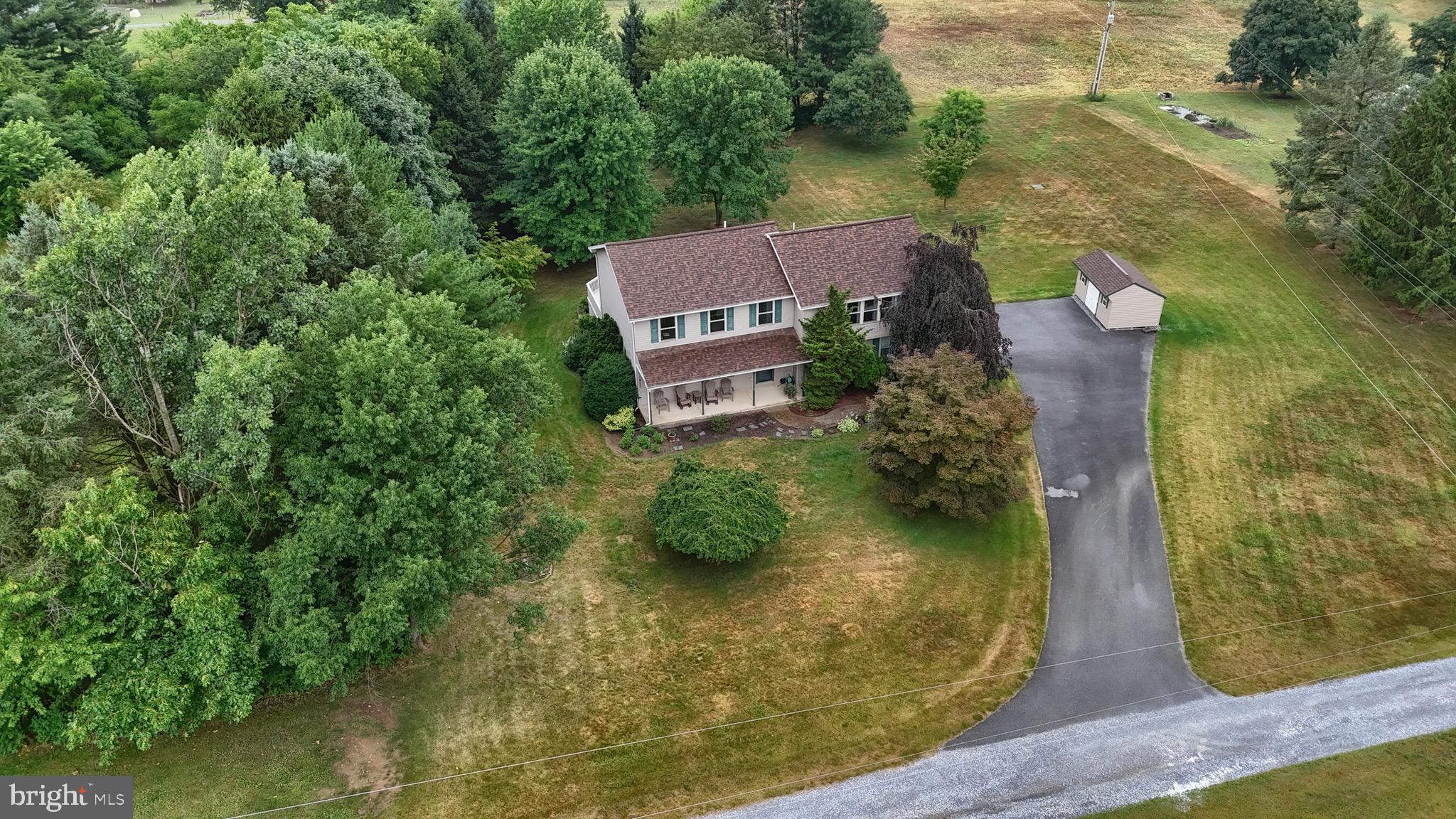 If you've been searching for a home with generous room sizes, over an acre of land, a finished lower level, and the privacy of peaceful country surroundings, 6 Stardust Drive deserves a look.  Situated on a private 1.16-acre lot in the ELCO School District, this well-maintained two-story home offers 4 bedrooms, 2 full baths, a convenient first-floor powder room, and 2,462 square feet of living space, plus an approximately 800-square-foot finished lower level.  The main floor features spacious living and gathering areas, a functional kitchen with abundant cabinet and counter space, and a dining area that opens to an expansive deck overlooking the private backyard.  Upstairs, you'll find four generously sized bedrooms, including an oversized primary suite with a private bath and ample space for a sitting area, reading nook, or home office.
The finished lower level provides exceptional flexibility for a family room, recreation area, home gym, or hobby space, while the unfinished storage area keeps seasonal items neatly tucked away.  Outside, the 1.16-acre lot offers the privacy and peaceful setting that make country living so appealing. Mature trees, open lawn space, an expansive deck, and a storage shed provide plenty of room to relax, entertain, or simply enjoy the outdoors. Energy-efficient geothermal heating and cooling provide year-round comfort, while the attached two-car garage offers additional storage.  Homes offering this combination of indoor living space, outdoor privacy, and over an acre of land don't come along every day. Schedule your private showing today.