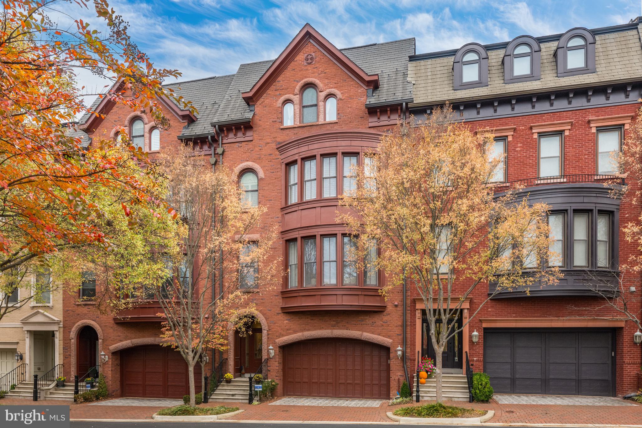 NEW OWNER'S RELOCATION IS YOUR GAIN! NEW OWNER REQUIRED TO RELOCATE FOR WORK MEANS A NEW OPPORTUNITY FOR BUYERS! 

The developers of The Brownstones at Park Potomac sought to meld the classic New York City Brownstones with the most sought-after community amenities (club house, pool, exercise room, tot lot/playground, snow removal, and lawn maintenance) for the discerning home buyer. And they succeeded! The convenience of living at Park Potomac is unmatched, with numerous restaurants, a grocery store, pharmacy, gyms, retail shops, and more located within easy walking distance. 

This four-level elevator townhome has it all, with stunning architectural detail, beautiful hardwood flooring, and crown molding throughout. A covered entry welcomes you to the first level of this all-brick home, with a foyer, gym with two mirrored walls, powder room, and two-car garage with a chair lift. 

The second floor is perfect for entertaining or more intimate family living with a dining room, living room with large bay window, study/den with built-ins, powder room, and family room with a gas fireplace flanked by arched built-ins. The heart of the home is the gourmet kitchen and breakfast area with a large center island, solid wood cabinets, new custom tile backsplash and granite countertops, and high-end appliances. The breakfast area has an atrium door that leads to a large, fenced-in, private brick patio.

The spacious primary bedroom with two large, organized walk-in closets is located on the third level along with the marvelous, recently renovated primary bathroom that has two vanities; a fabulous, oversized shower with both overhead and handheld fixture; grab bars; and upscale electronic controls; a separate tub with chandelier above; and a Kohler bidet toilet. There are two additional bedrooms, a full bath, and a laundry closet on this level as well.

The fourth level features a large Recreation Room with two sets of atrium doors that lead to a wonderful rooftop terrace. There is a fourth bedroom and an additional full bath. If you desire an au pair or in-law suite, this could easily fit the bill. Like all levels of this thoughtfully laid-out home, this is also serviced by the elevator.

The Brownstones are just off I-270 at Montrose Road, providing immediate access to the Capital Beltway as well as major routes through Montgomery County, into Washington, DC, and across the Potomac River to Northern Virginia.
