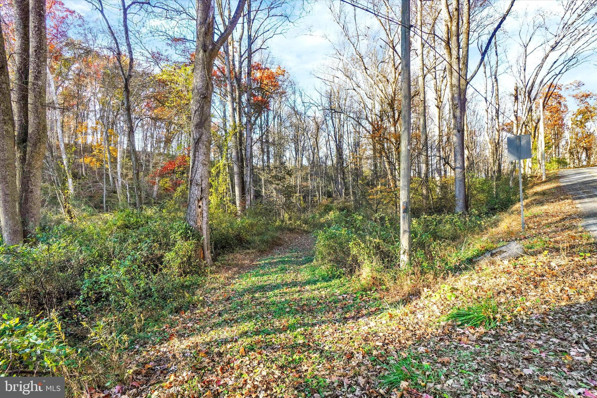 Looking for the perfect getaway spot!?! This 3.44 Acre wooded lot offers peace, privacy, and the ideal setting for your dream retreat, tiny home, or cozy cabin. Tucked away off the beaten path, this secluded property features beautiful natural surroundings; a picturesque creek runs through part of the land; and mature trees that create a serene atmosphere. Electric service is available, making it easy to bring your vision to life. Whether you’re seeking a weekend escape, a rustic hideaway, or a place to build something truly special, this property delivers serenity and seclusion in abundance. Located within the Red Lion School District, it’s just a short drive from local amenities while feeling worlds away from the hustle and bustle. Come experience the peaceful beauty of this hidden gem.  AGENTS - Please read Agent Remarks!