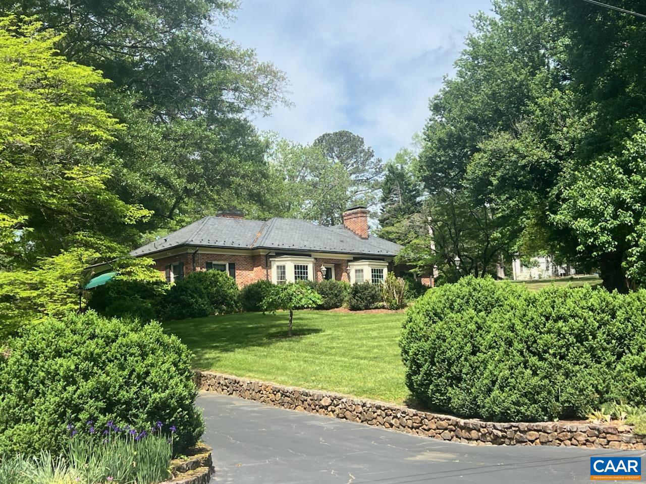 A remarkable property in Bellair.... Set on a 1.9 acre beautifully landscaped, elevated lot...Magnificent trees and grounds...Gracious and comfortable....Unique and gracious floor plan ...Living room(w/FP) and dining rooms with floor to ceiling walk-in bay windows, family room with fireplace opens, to the bright sunroom overlooking the stunning pool setting...Many custom features: copper gutters, slate roof, 2 sunrooms, circular driveway to the front entrance, lower driveway to the terrace level...Full terrace level with french doors open the family room has built-in bookcases, masonry fireplace, huge wet bar, room for a pool table, wide corridor to study, laundry room and playroom...,Fireplace in Family Room,Fireplace in Living Room,Fireplace in Rec Room,Fireplace in Study/Library