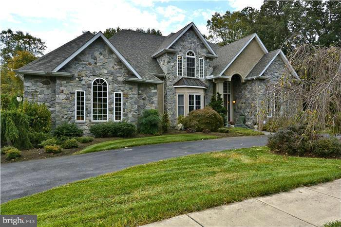 Shake off the winter blues and come see this luxurious custom home!  Over 3800 sq ft Luxurious Custom Home  Custom amenities Include:Main Lvl Master, Whole House Generator, 2 1000 Gal Propane Tanks, In-ground Pool w/ Jacuzzi and Waterfall, Custom Kitchen w/ Wolf Quality App, Granite Counters, 1st Floor Master, Underground Sprinkler, Instant Hot Water, Movie Theater, LL In-law Suite,