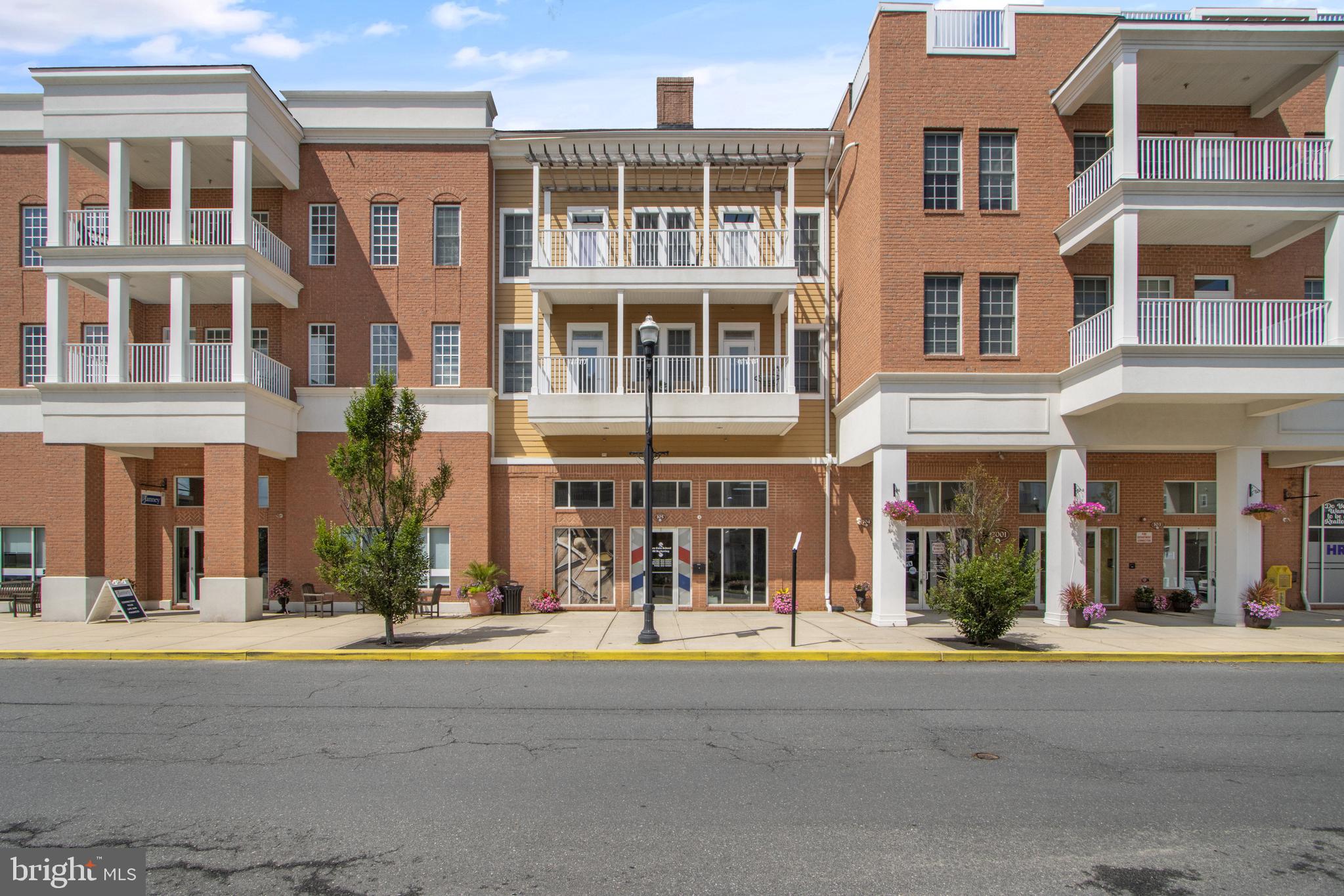 Welcome to The Vineyards — this beautifully upgraded 2-bedroom, 2-bathroom condo offers stylish living in a prime location, close to Redner's Market & Nassau Valley Vineyards with direct access to the Lewes/Georgetown trail.  Located only 5-miles from the beach with quick access to Route 9 and Coastal Highway.   

Formerly the builder’s model home, this unit is loaded with premium features including granite countertops, soft-close cabinetry, tile backsplash, and stainless-steel appliances in the kitchen.  The common areas of the building have also been thoughtfully remolded with new carpet and paint.

The living room showcases custom built-ins, surround sound, a cozy fireplace, and access to your own private balcony. Both bedrooms feature spacious walk-in closets, while the in-unit laundry and additional storage closet add extra convenience.

Enjoy all that the Vineyards has to offer with their resort like amenities that include a clubhouse with a fitness center and billiards room, in ground pool, walking trails, volleyball and pickleball courts, a fishing pier with kayak launch, a dog park and a Lakeview Terrance with firepit and grills.

Move-in ready and thoughtfully designed for modern comfort and convenience!  Schedule your private tour today.