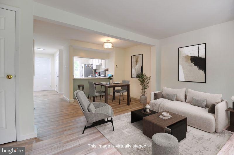 Many UPDATES with this Renovated Home!  ****$500 towards a home warranty with a full price offer. ****  Welcome home to this stunning end-unit townhome in the highly sought-after Newington Forest community! DID I SAY END-UNIT?!? YES!!!!  TWO (2) ASSIGNED PARKING SPACES! 2 FULL-BATHS AND ONE HALF-BATH.  This move-in-ready gem has been updated, featuring brand-new flooring throughout (2026 and 2019) and fresh neutral paint (2026).The fully renovated kitchen shines with new countertops and a new hood vent (2026). Major systems and exterior upgrades provide peace of mind, including new windows throughout (2024), a new HVAC (2019), a new front door (2026), and a new storage shed (2022). The finished walk-out basement includes a full bath (2019) and a dedicated laundry room (2018). Step outside to a private yard featuring a brand-new wooden gate (2026). Enjoy unparalleled community amenities: a private pool, tennis, pickleball, and basketball courts, plus direct access to Fairfax County walking and biking trails. Style, comfort, and a vibrant lifestyle await! DID I SAY END-UNIT?!? YES!!! Deadline for offers is going to be set soon.
